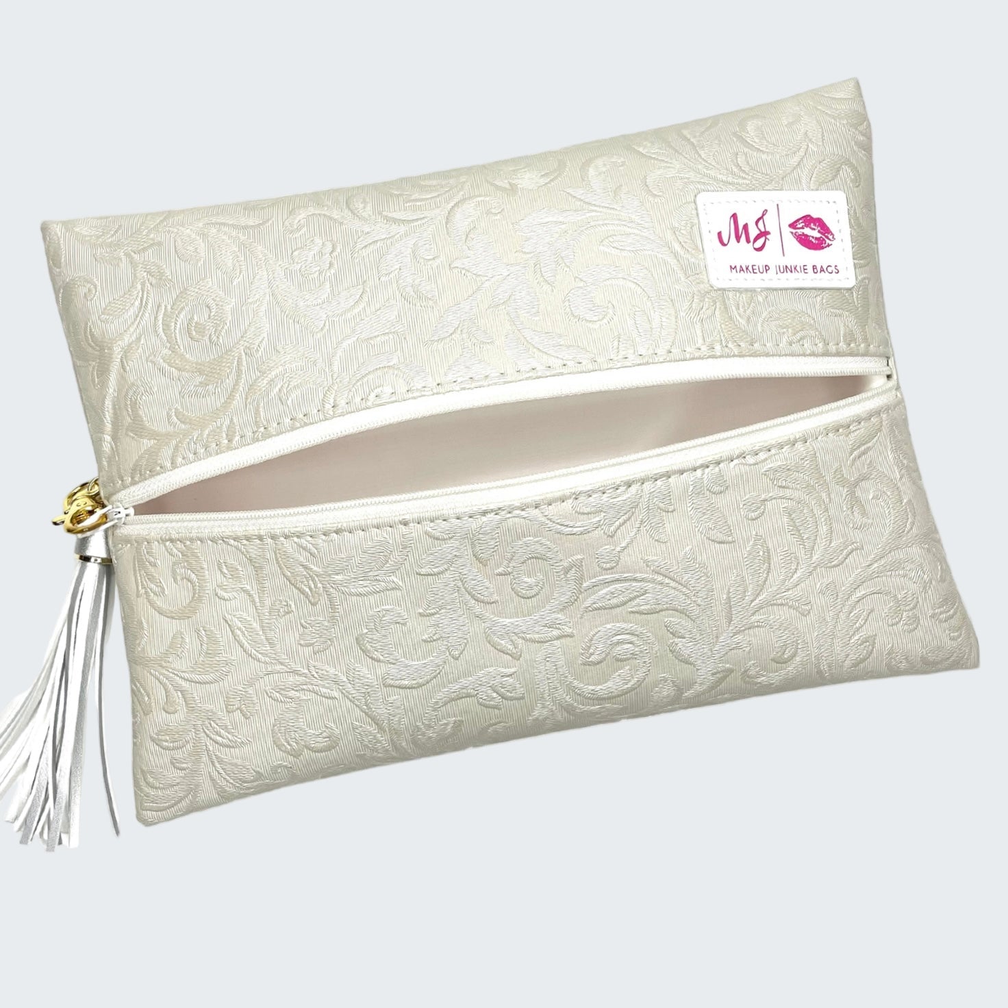 Embroidered makeup bag with a visible brand logo on a white background
