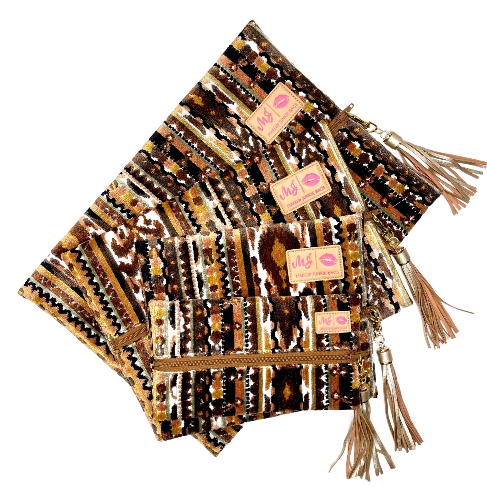 Patterned pouches with tassels and visible branding on a white background