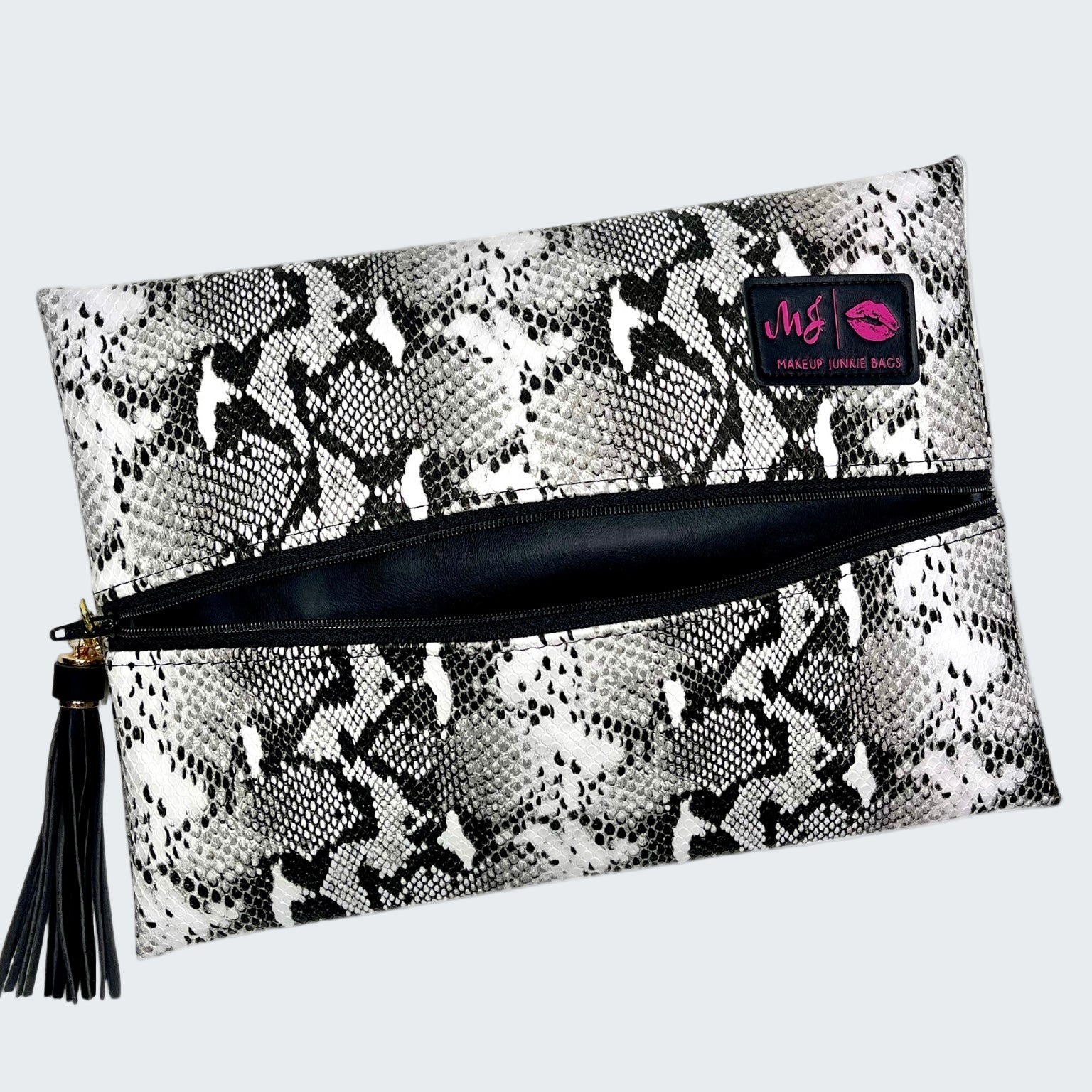 Makeup bag with snake pattern and visible brand logo on a white background