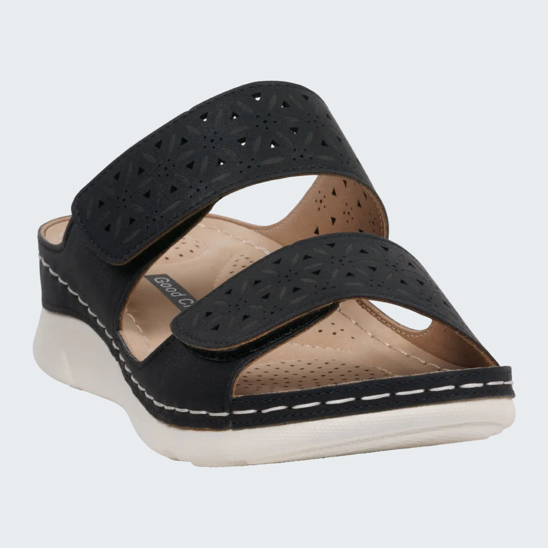 Black sandal with white sole on a white background