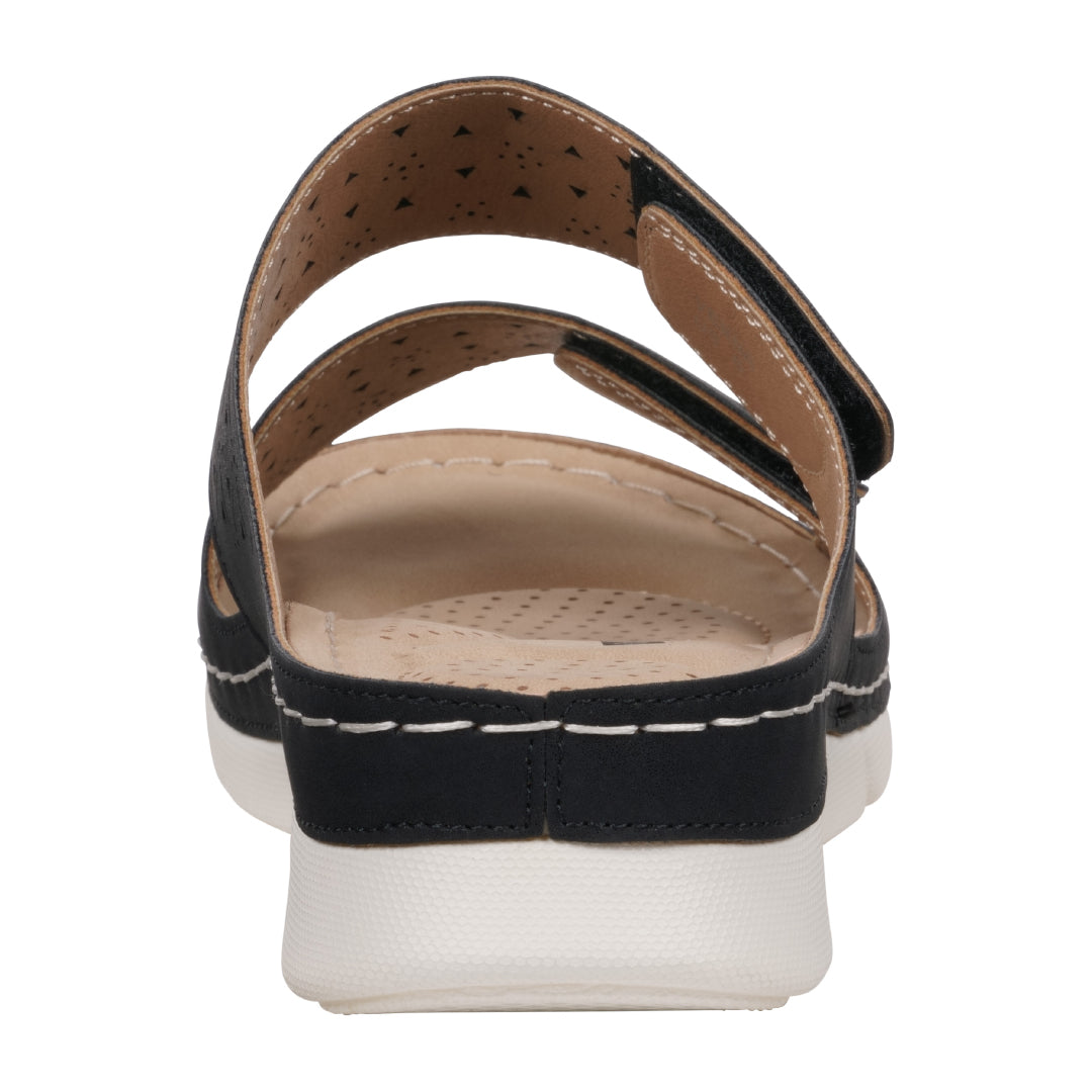 Black sandal with white sole on a white background