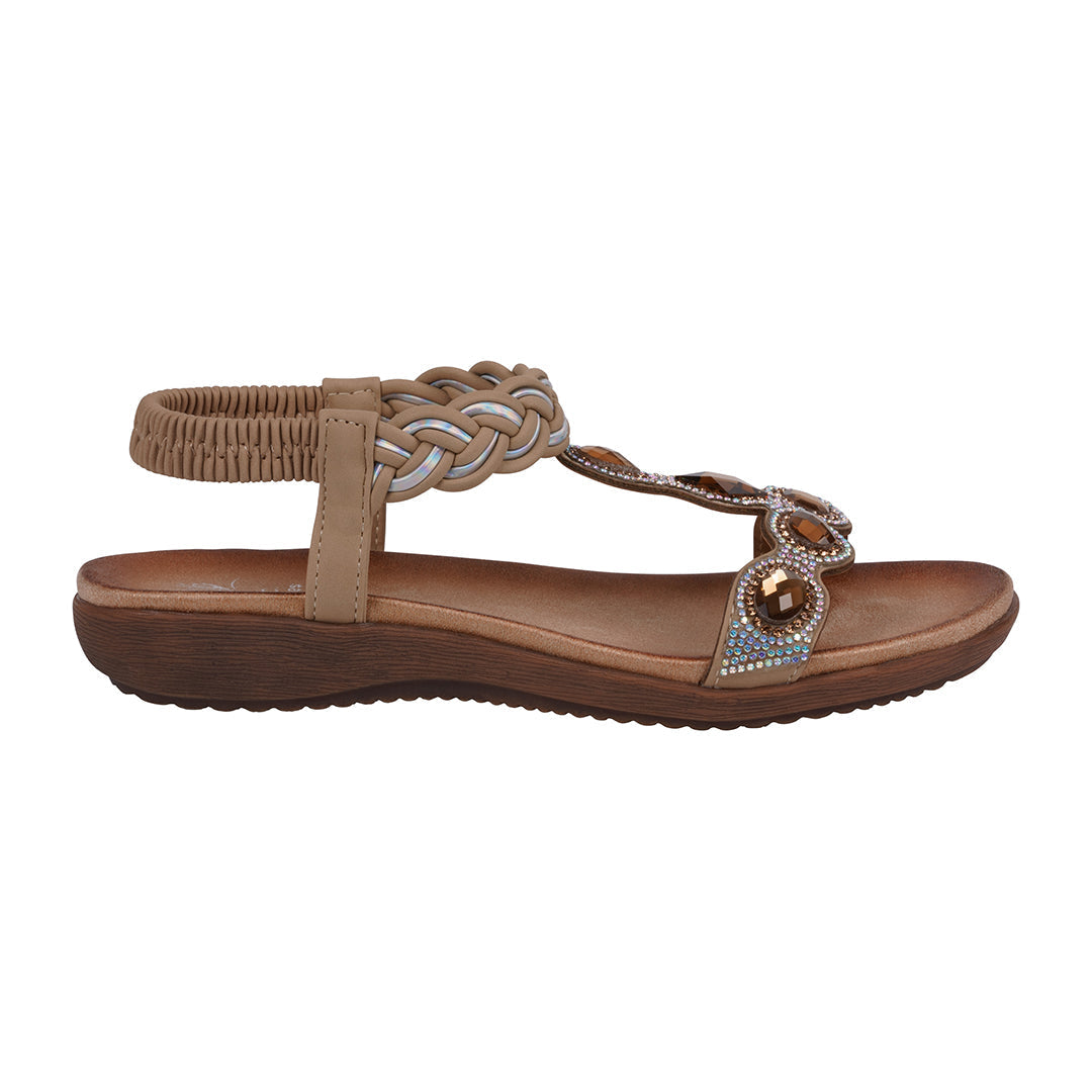 Brown sandal with decorative strap on a white background
