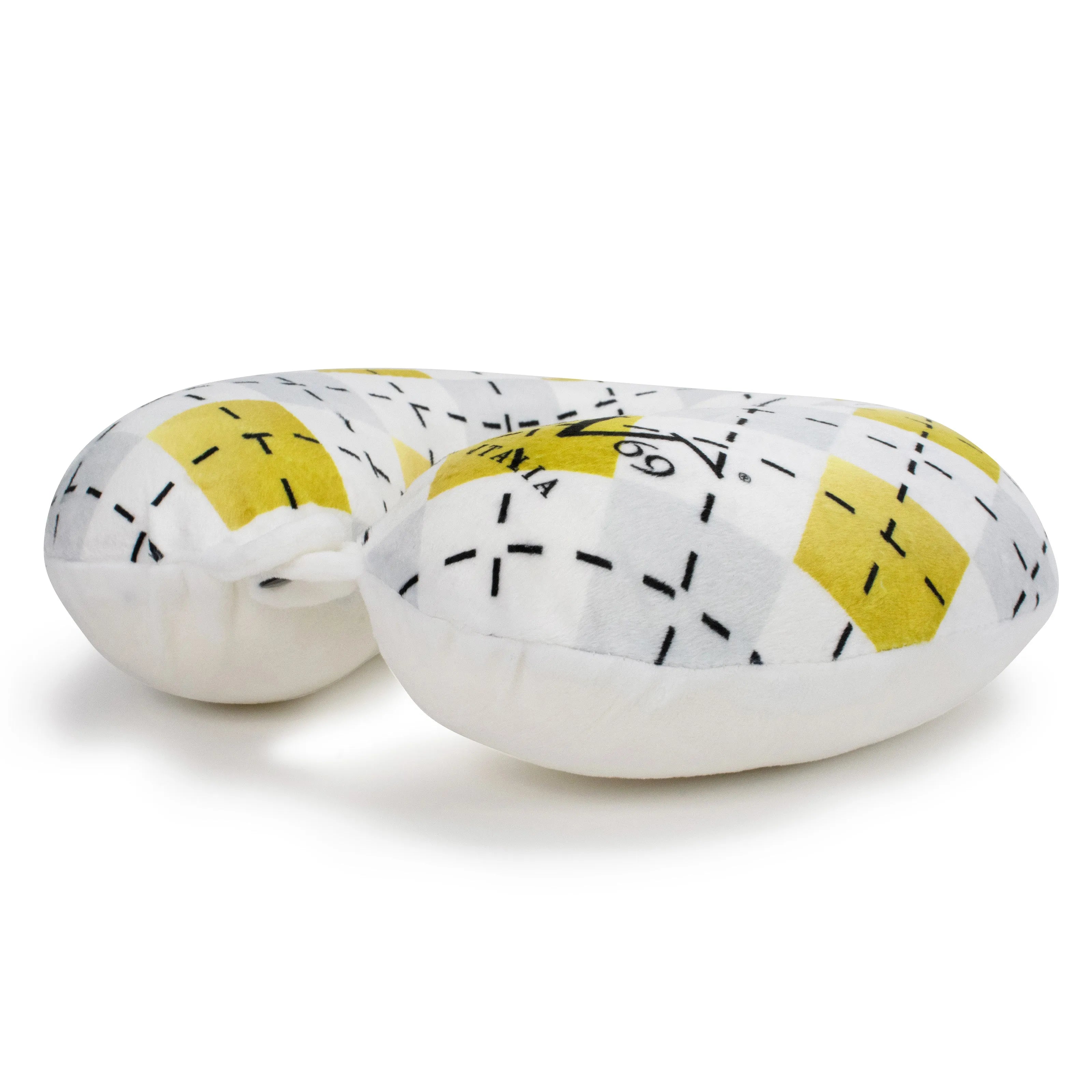 Two white neck pillows with yellow and black abstract patterns on a white background