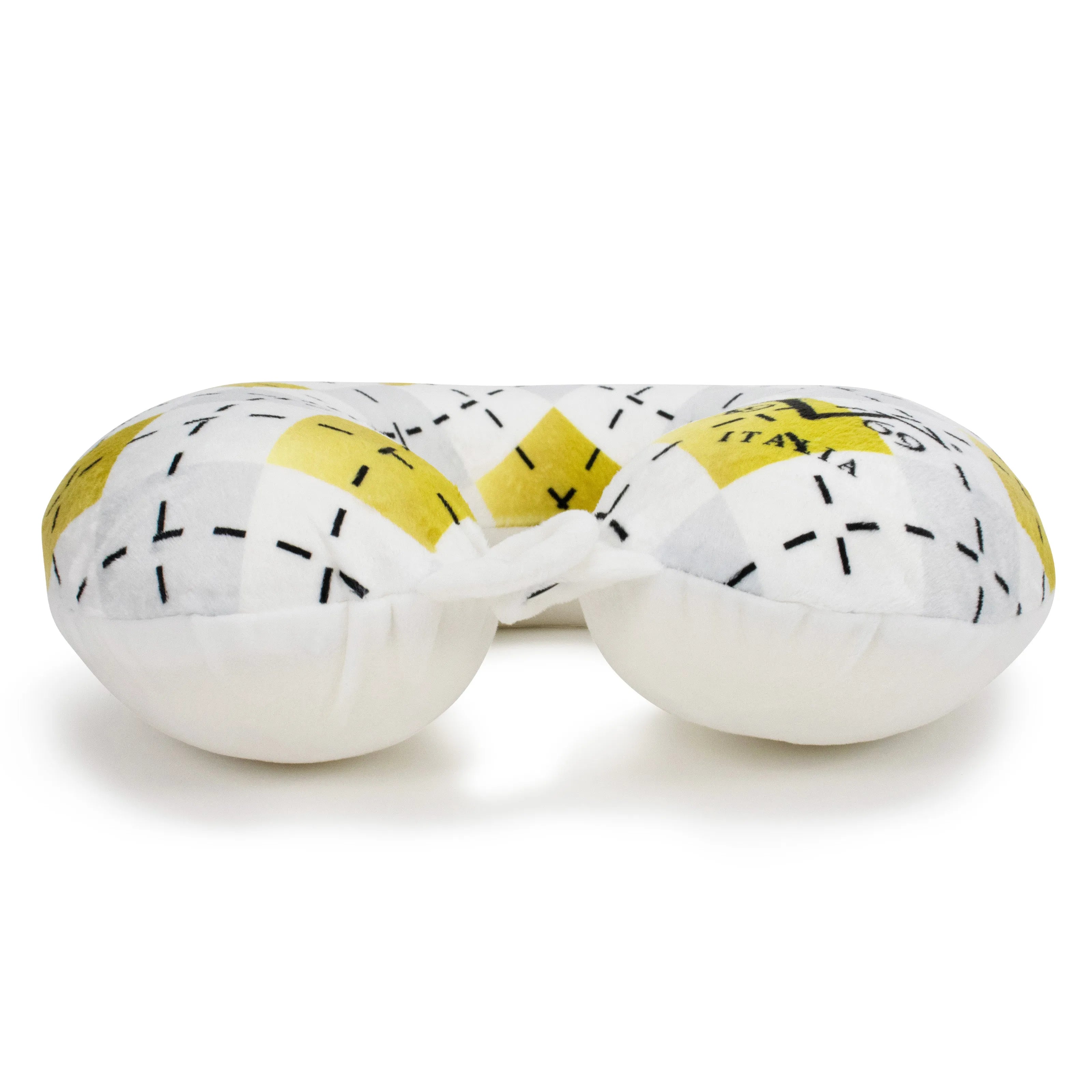 White neck pillow with yellow and black patterns on a white background