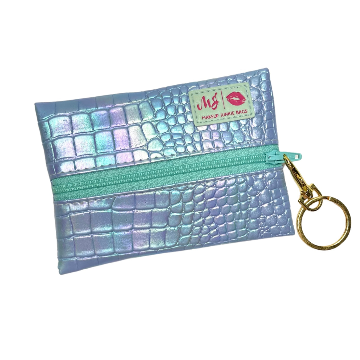 Iridescent makeup bag with a gold keychain on a white background