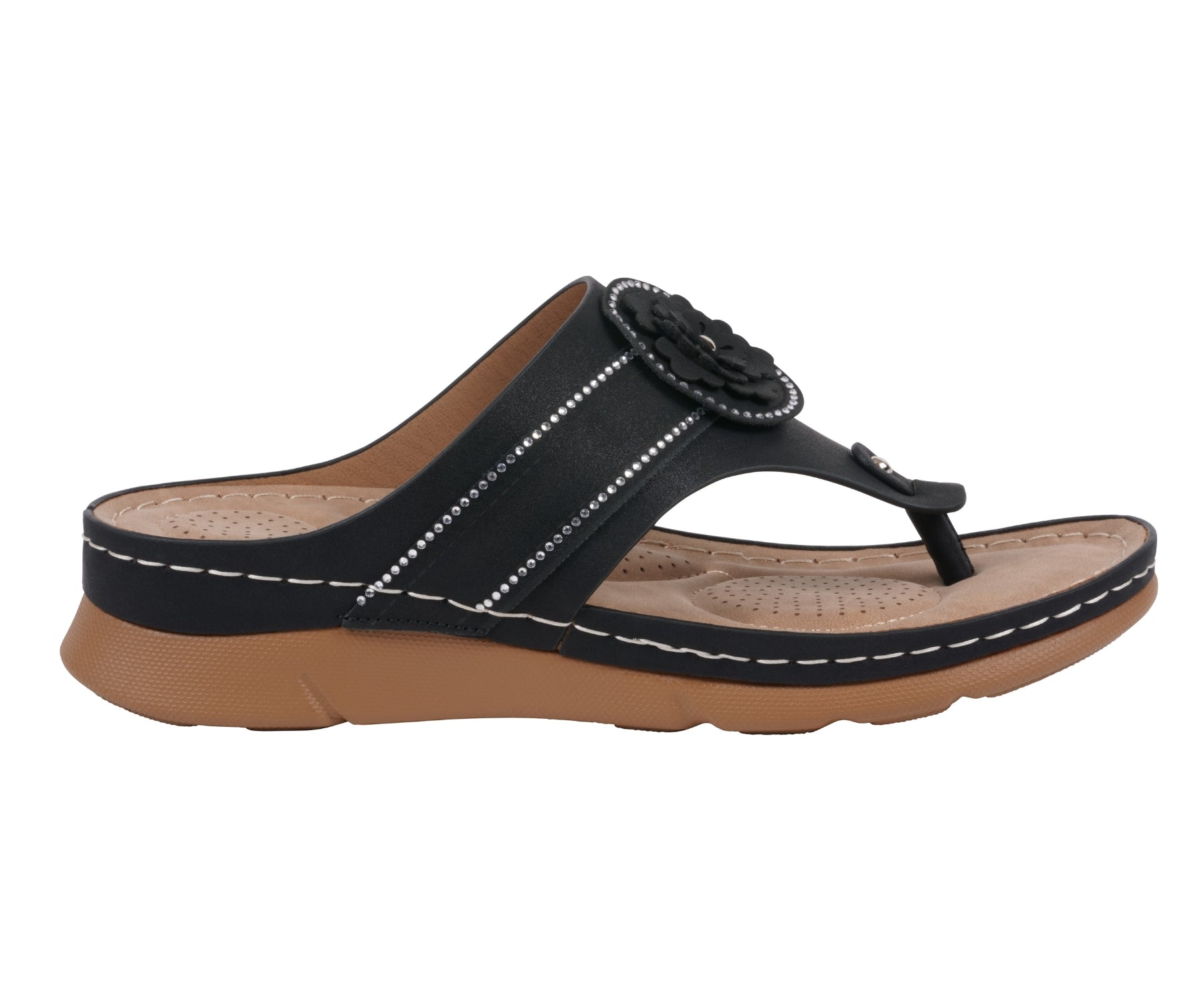 Black sandal with a flower detail on a white background