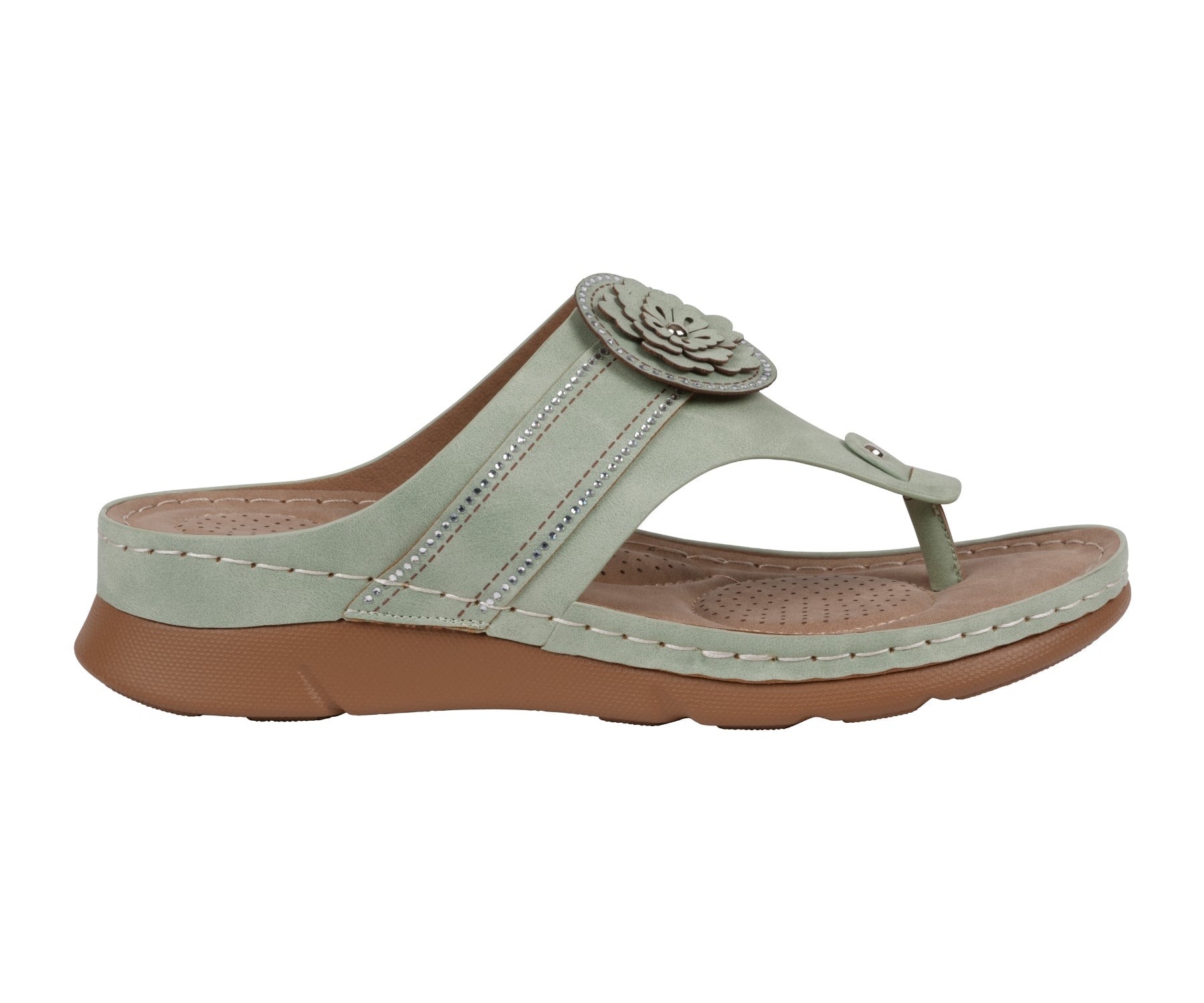 Light green sandal with a brown sole on a white background