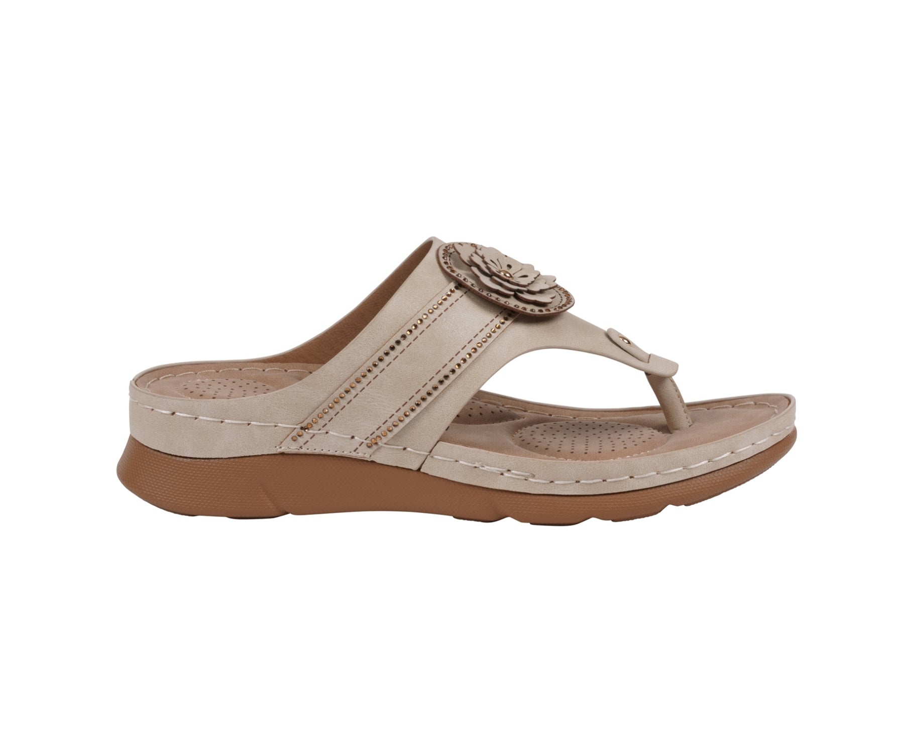 Beige sandal with a brown flower design on a white background