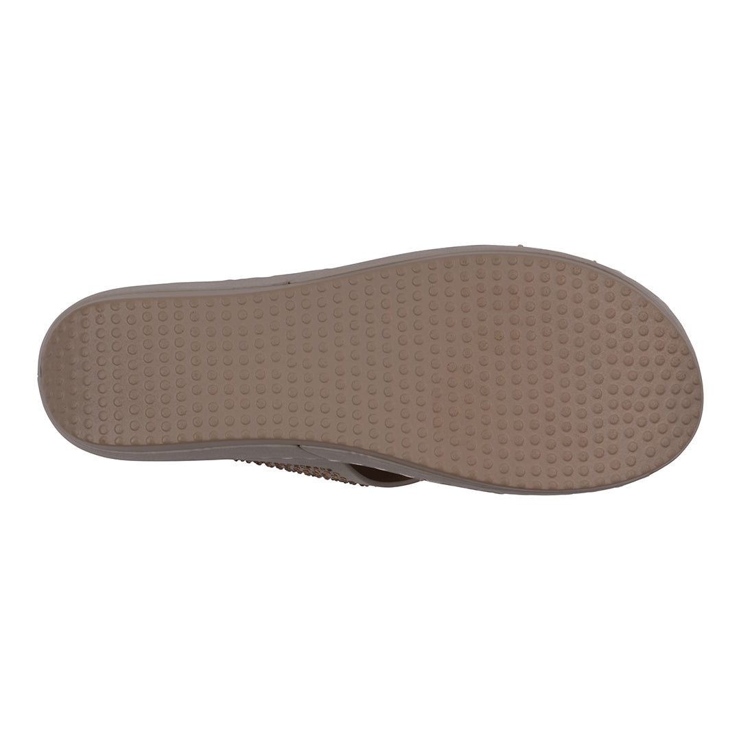 Brown sole of a shoe on a white background