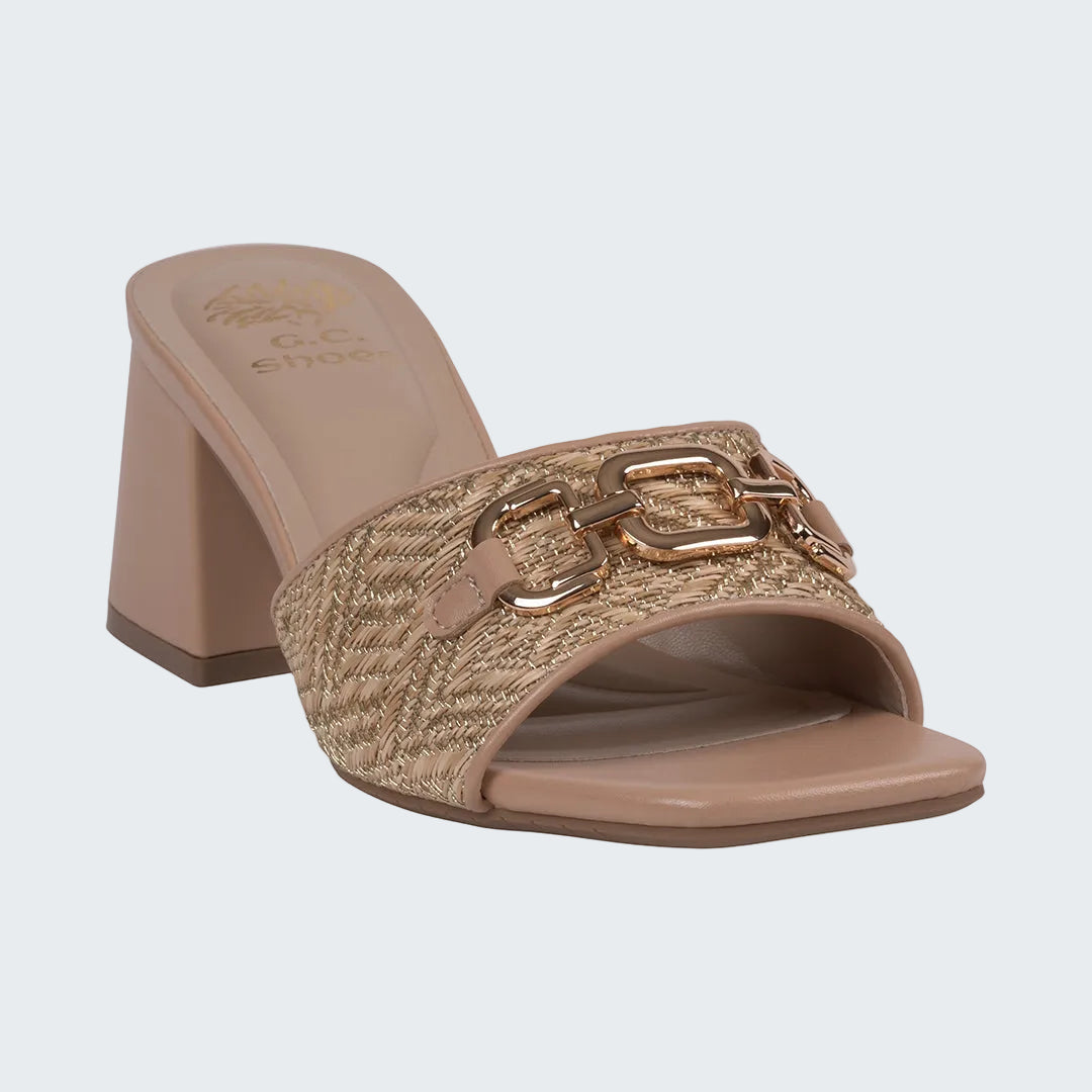 Beige sandal with gold embellishments on a white background