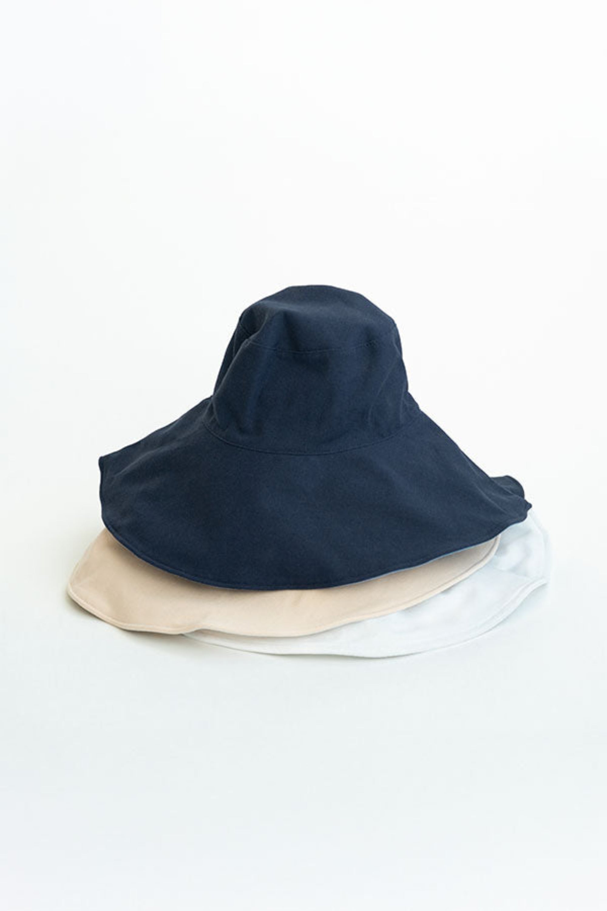 Navy blue bucket hat on a white background