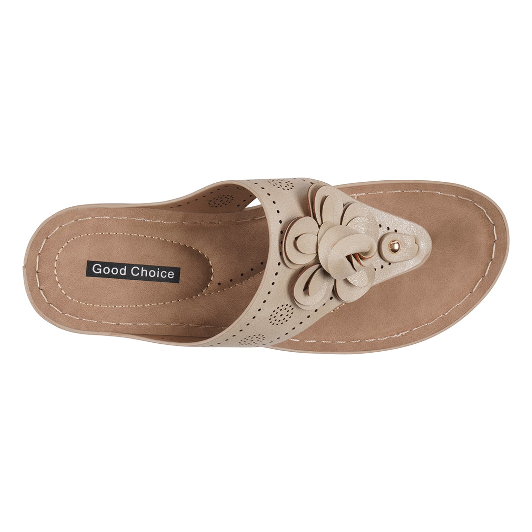 Beige sandal with floral design on a white background