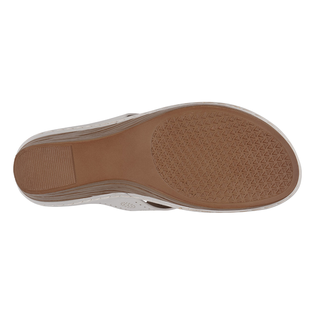 Brown sole of a shoe on a white background