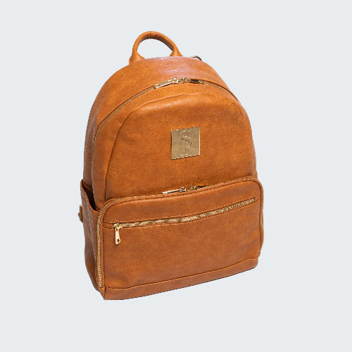 Brown leather backpack with gold zipper and logo on a white background