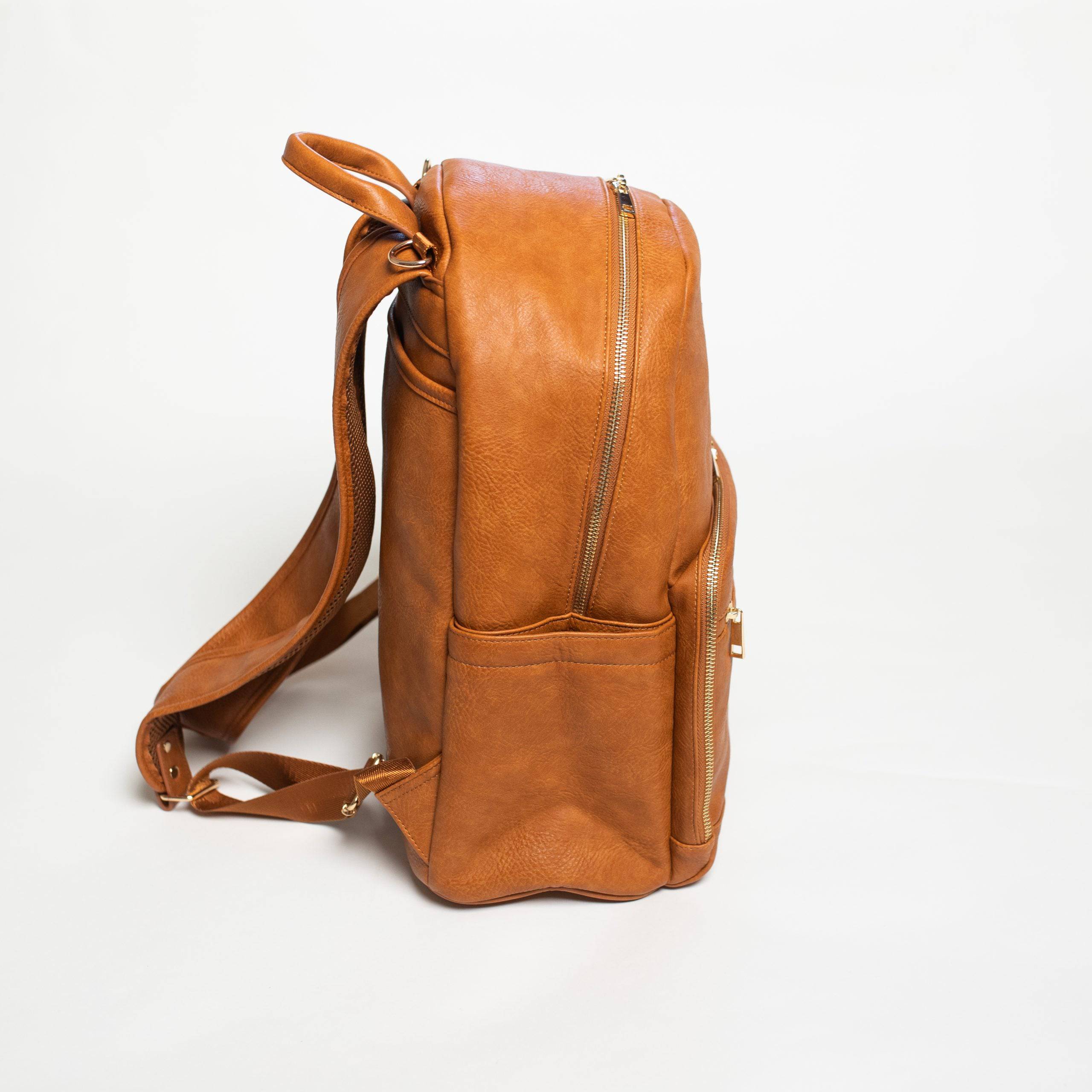 Brown leather backpack on a white background