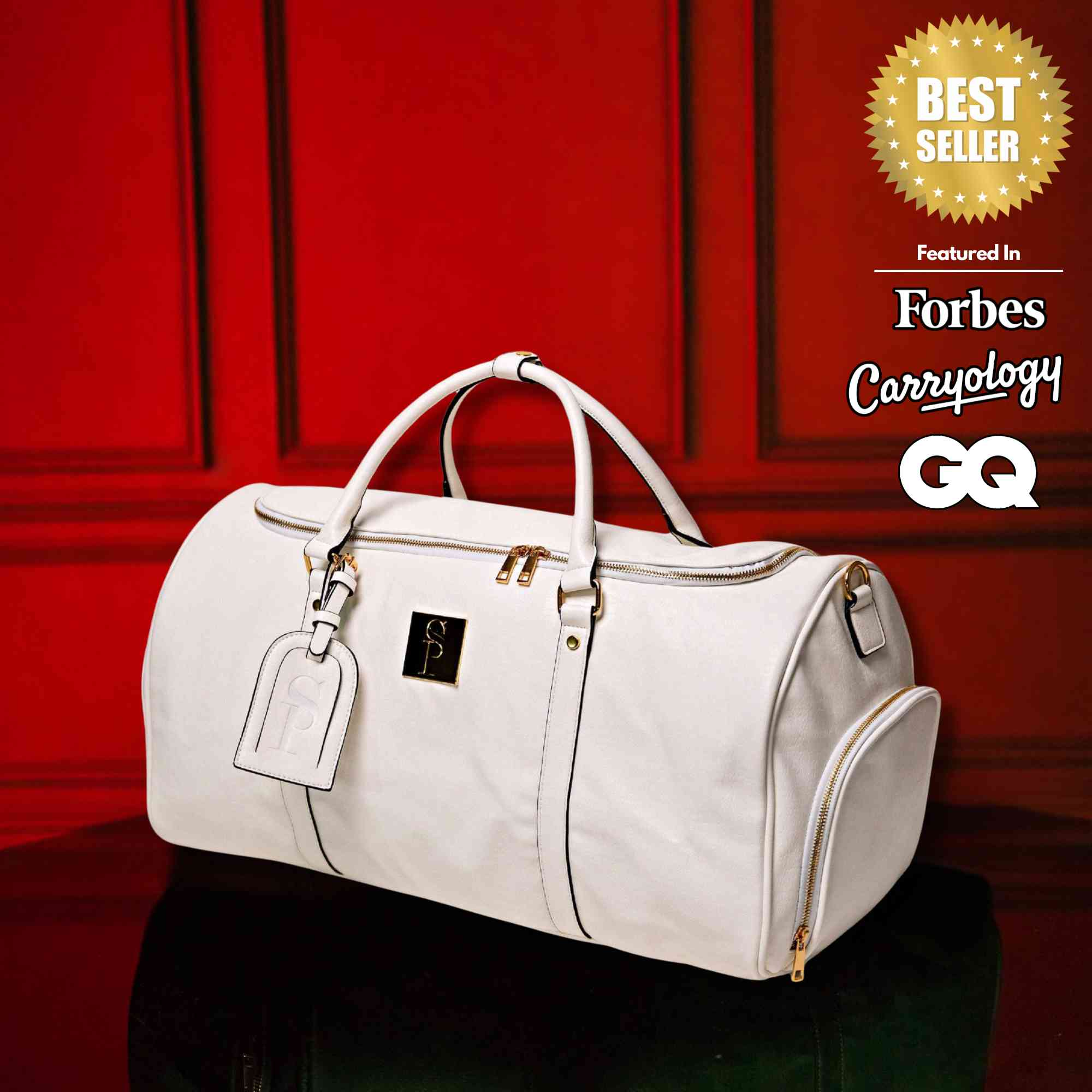 White duffel bag on a dark surface with a red background, featuring 'Best Seller' and magazine logos.