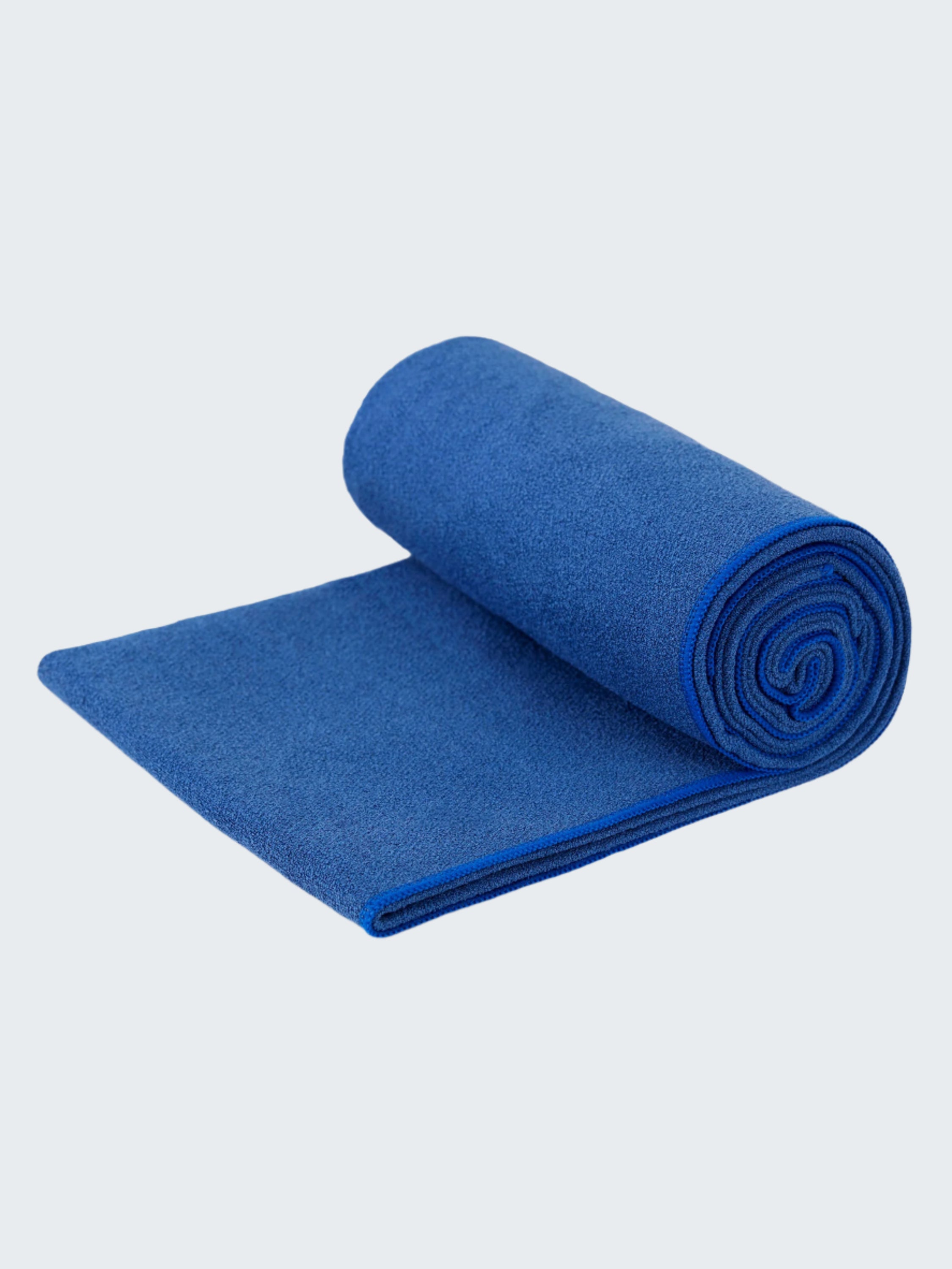 Rolled-up blue towel on a white background