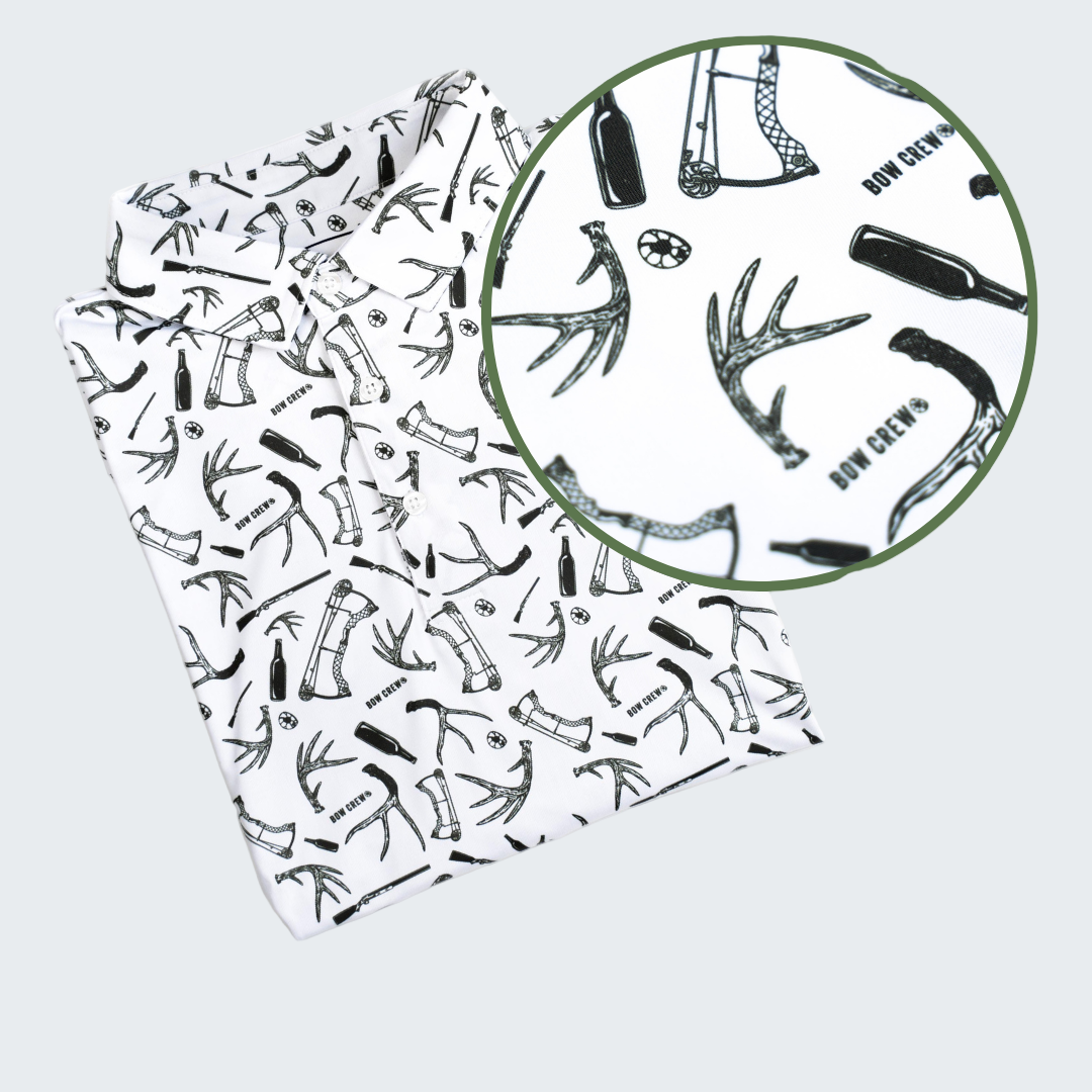 Patterned paper with hunting-themed illustrations on a white background