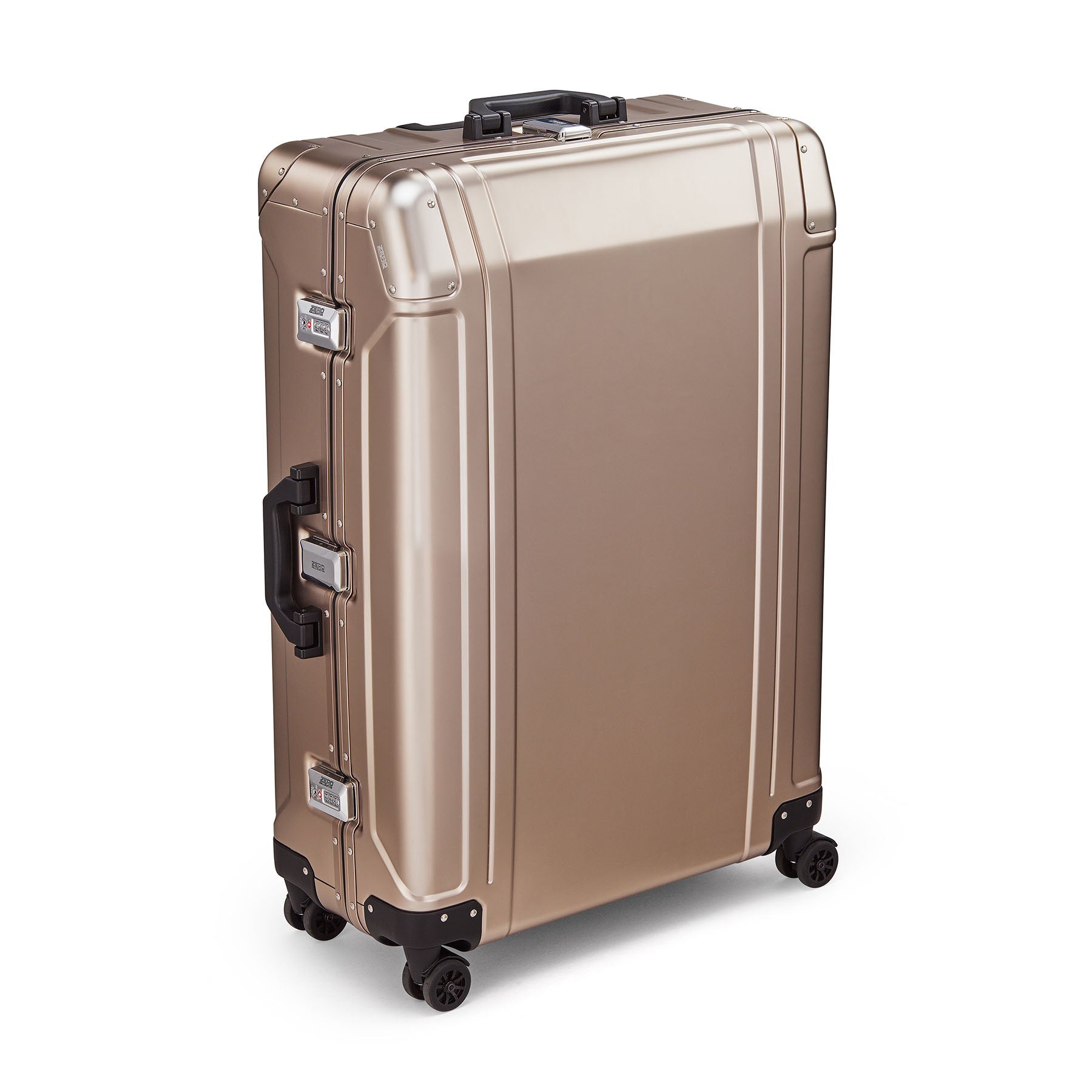Gold suitcase with black wheels on a white background