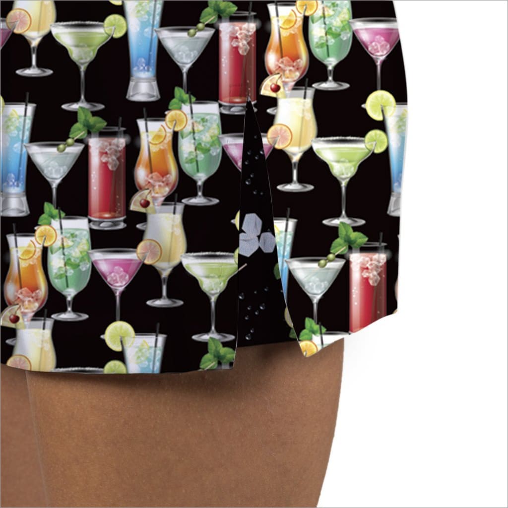 Patterned paper with colorful cocktail illustrations on a black background