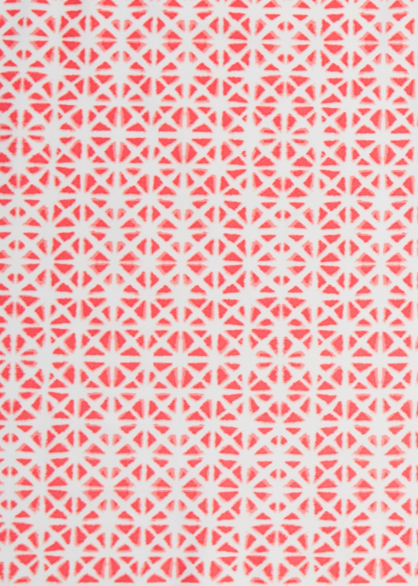 Geometric pattern with red and white shapes on a pink background