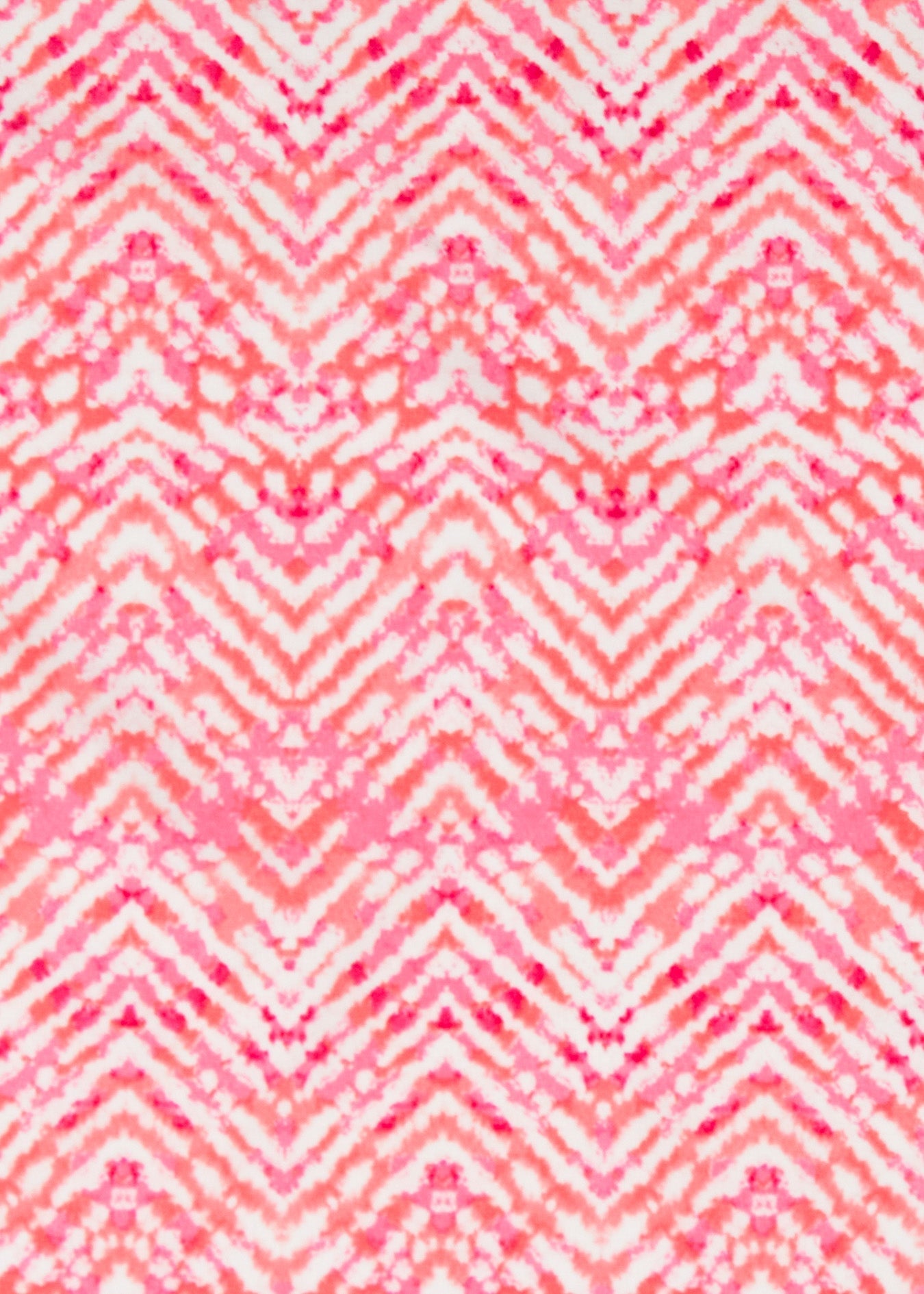 Patterned fabric with pink and white zigzag design