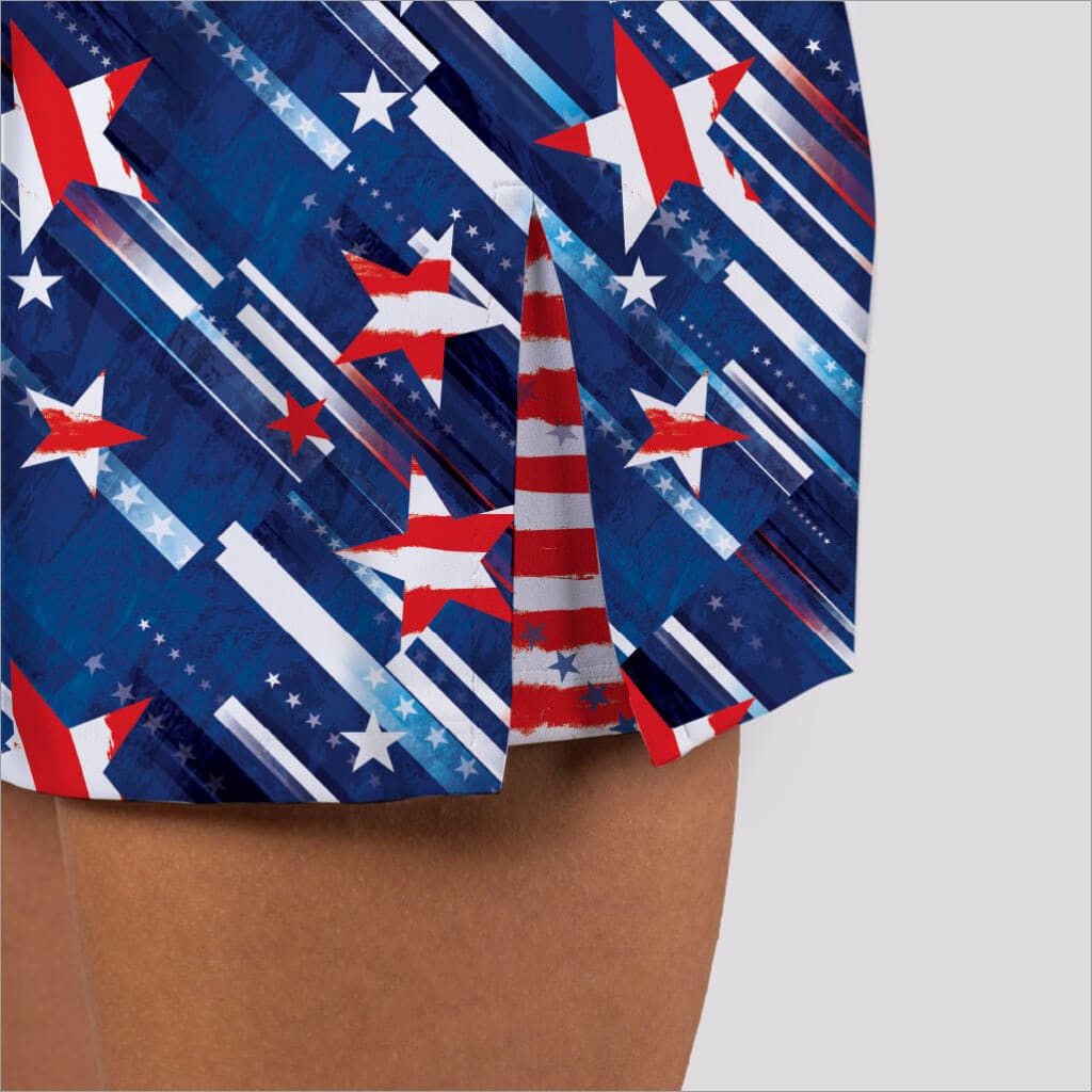 Folded fabric with red, white, and blue star and stripe pattern on a neutral background