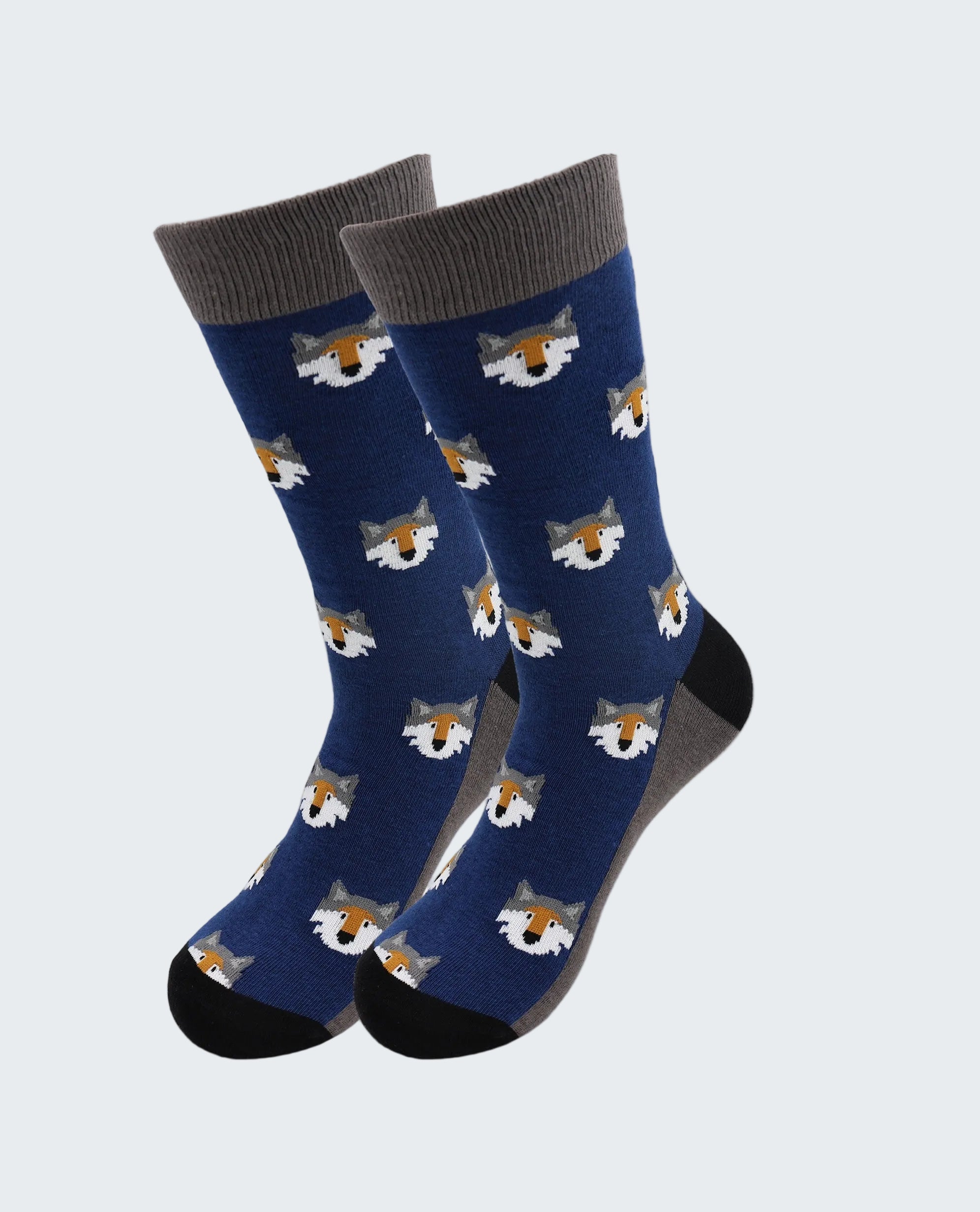 Pair of blue socks with fox pattern on a white background