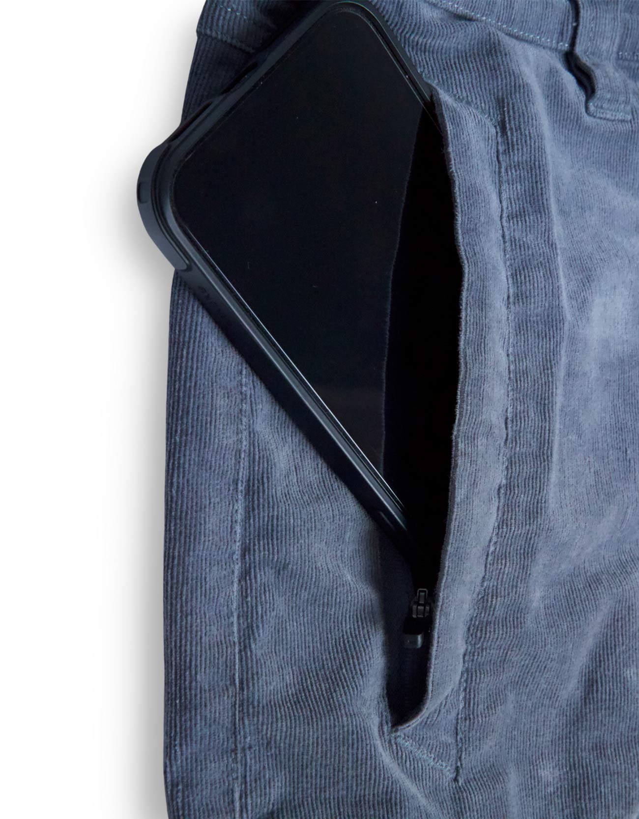 Black phone case in a pocket of gray pants