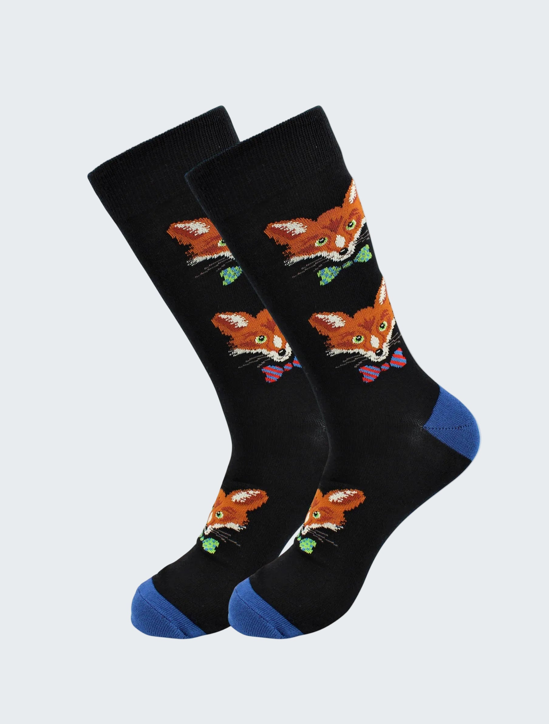 Black socks with fox designs and blue toes on a white background