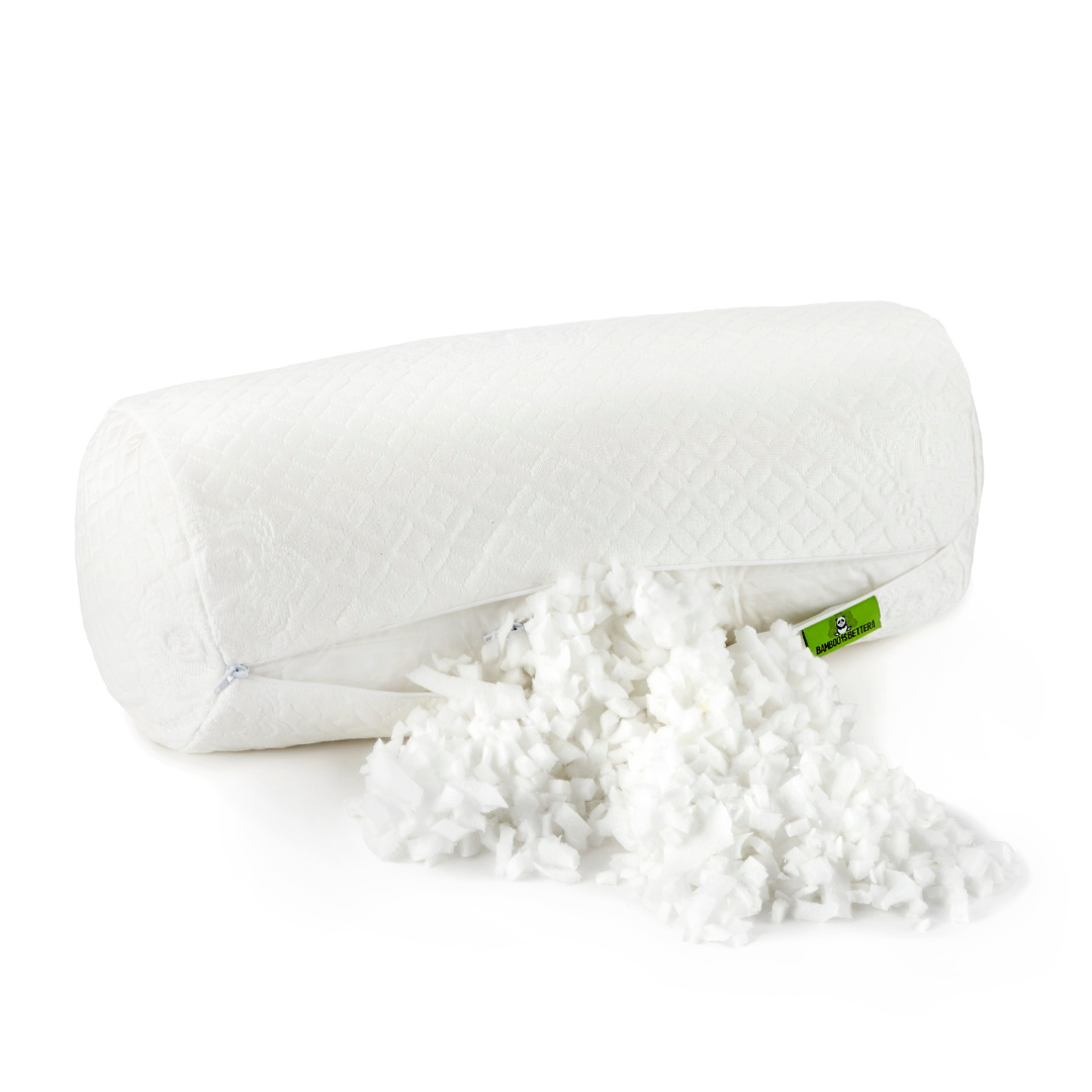 White pillow with a green tag on a white background