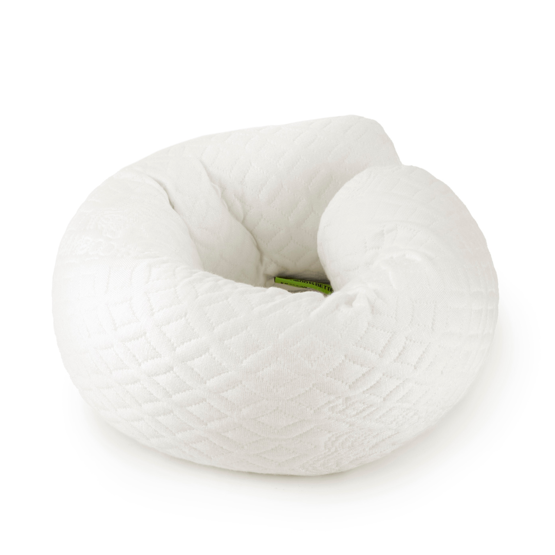 White donut-shaped pillow on a white background