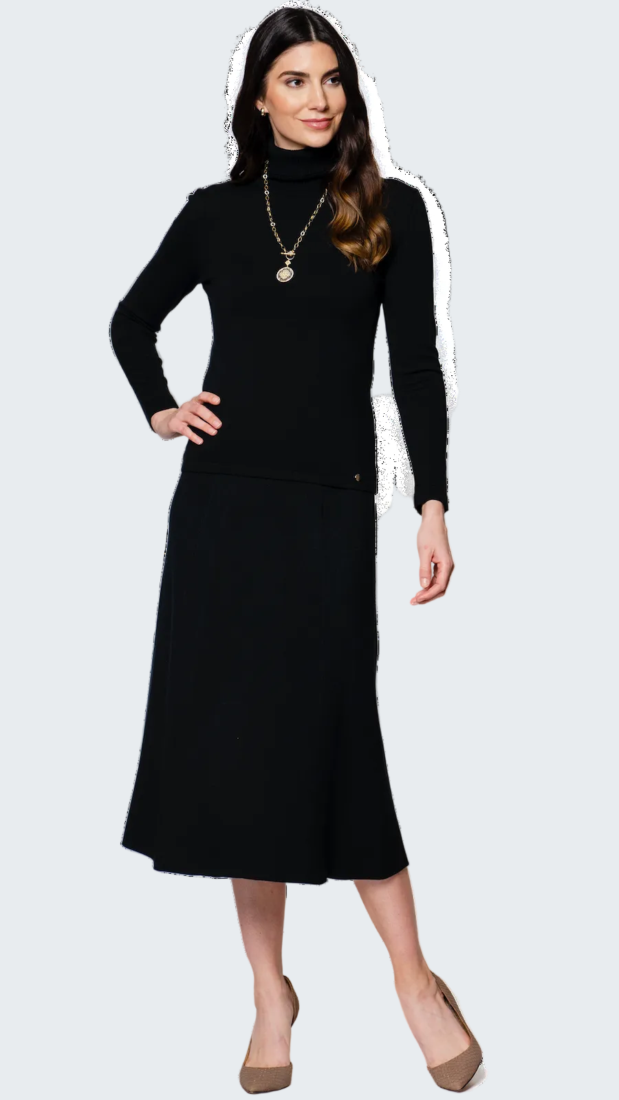 Woman wearing a black dress with a white background