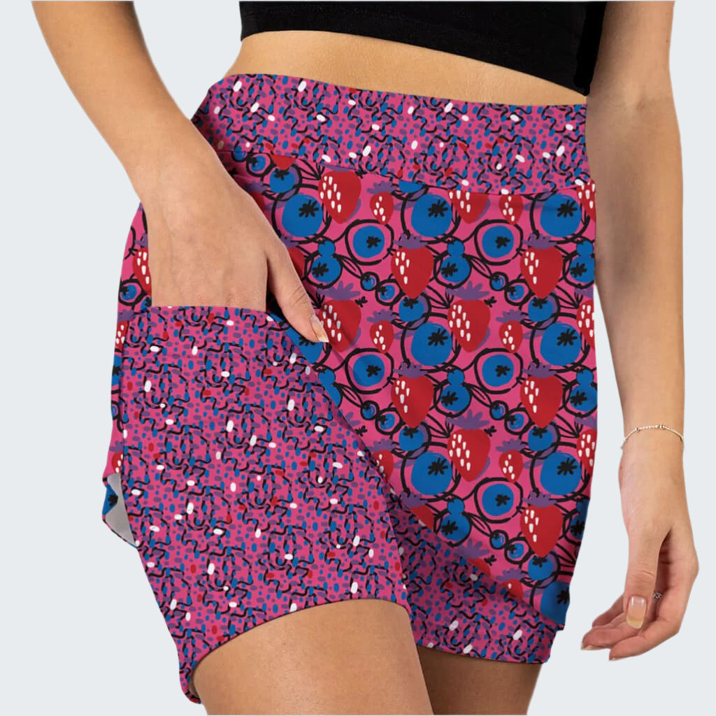 Colorful patterned shorts worn by a person on a white background