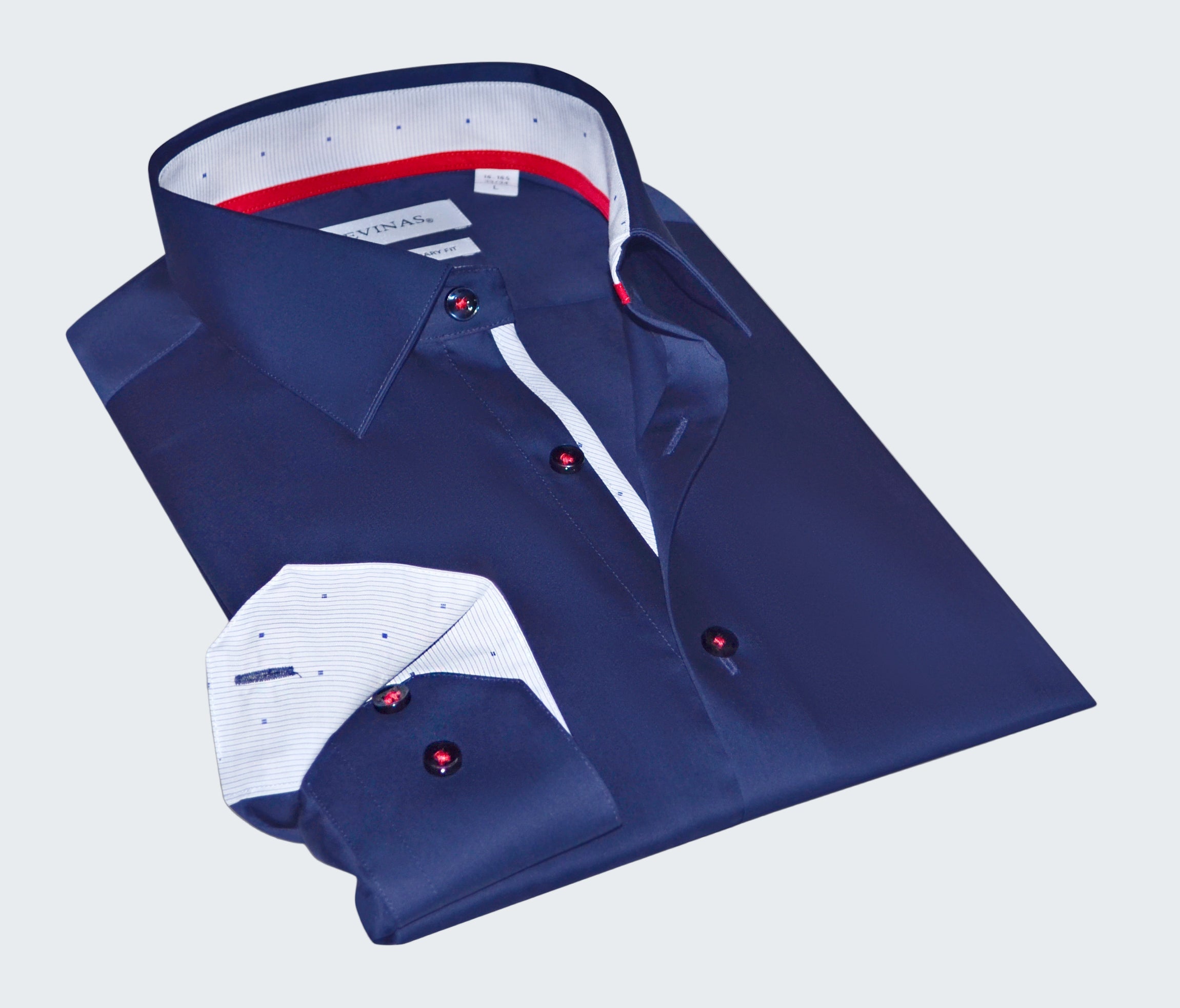 Folded blue dress shirt with white interior on a white background