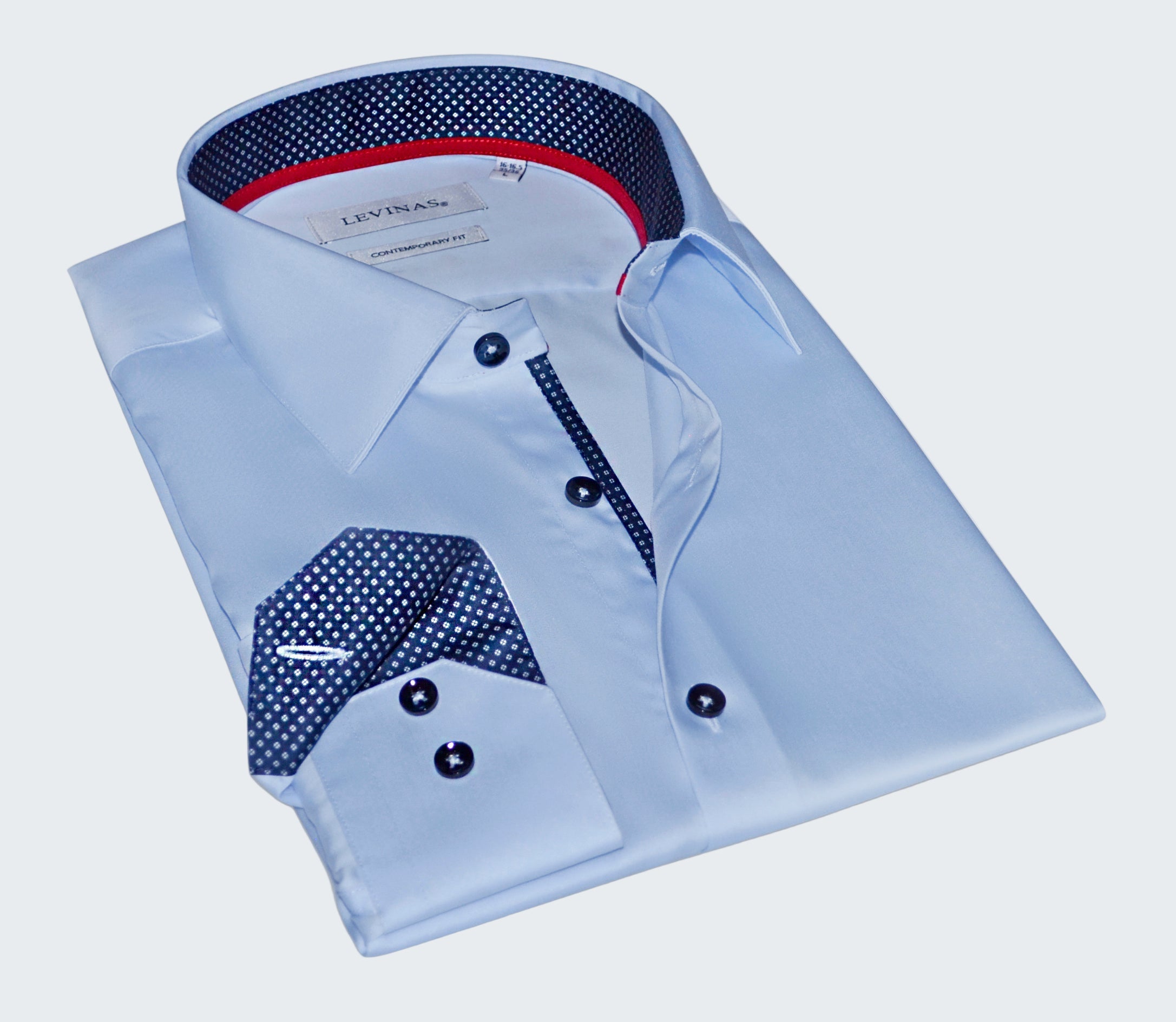 Light blue dress shirt with patterned collar and cuffs on a white background