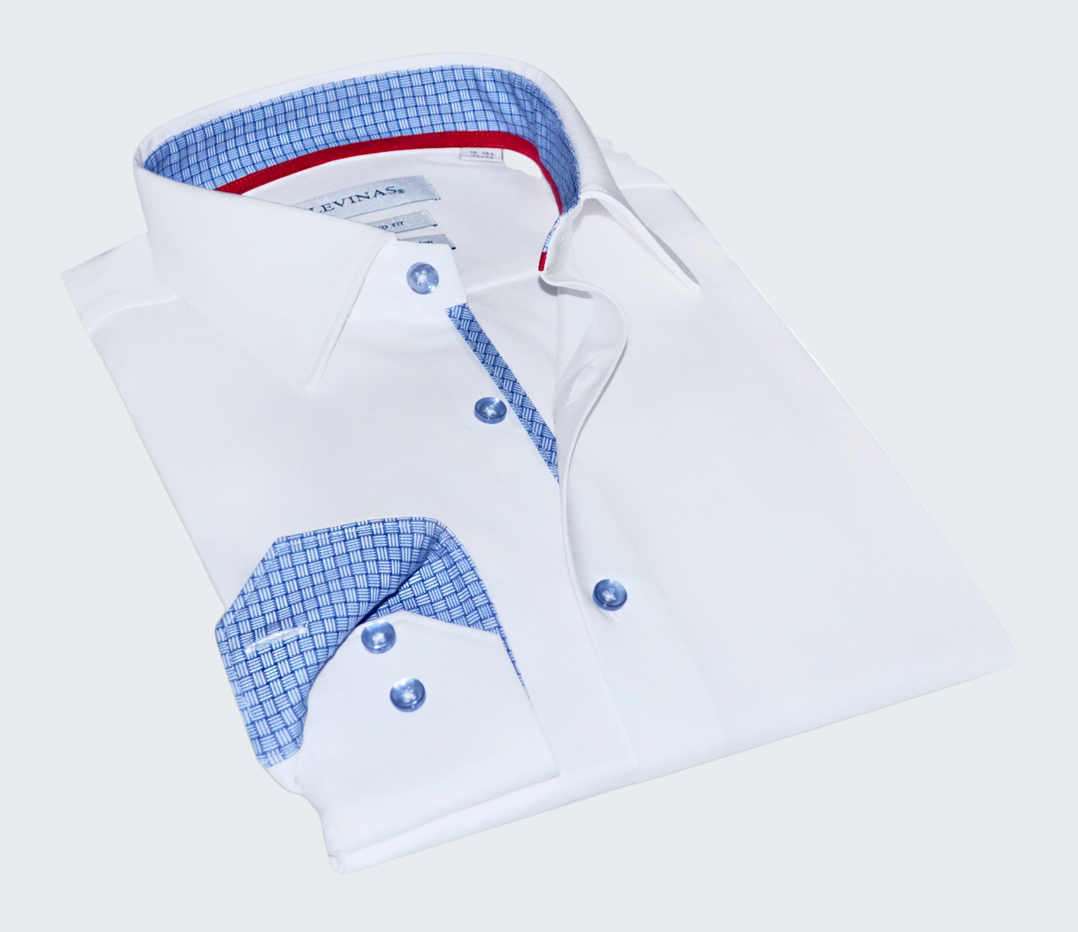 Folded white dress shirt with blue checkered interior on a white background