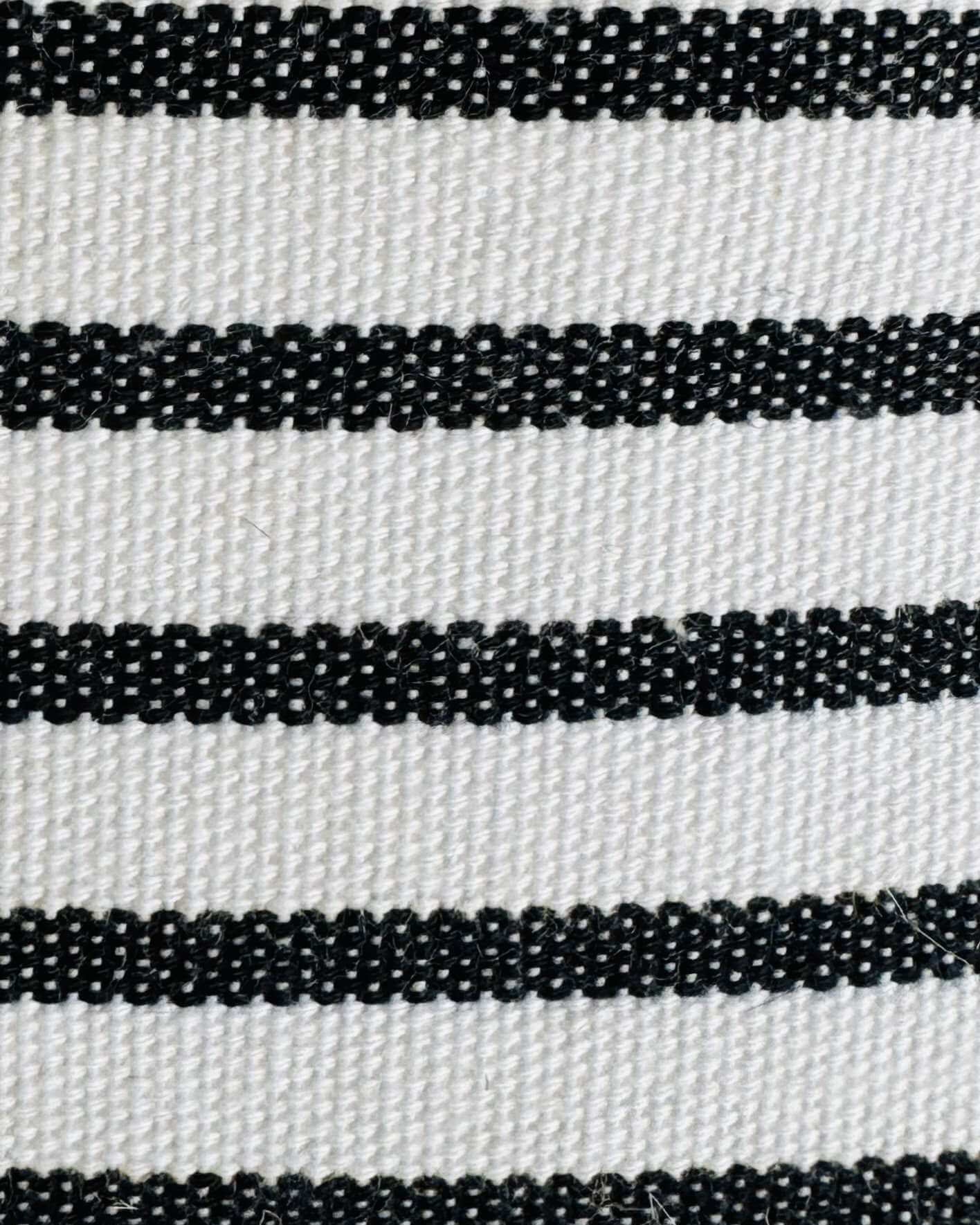 Close-up of black and white striped fabric pattern