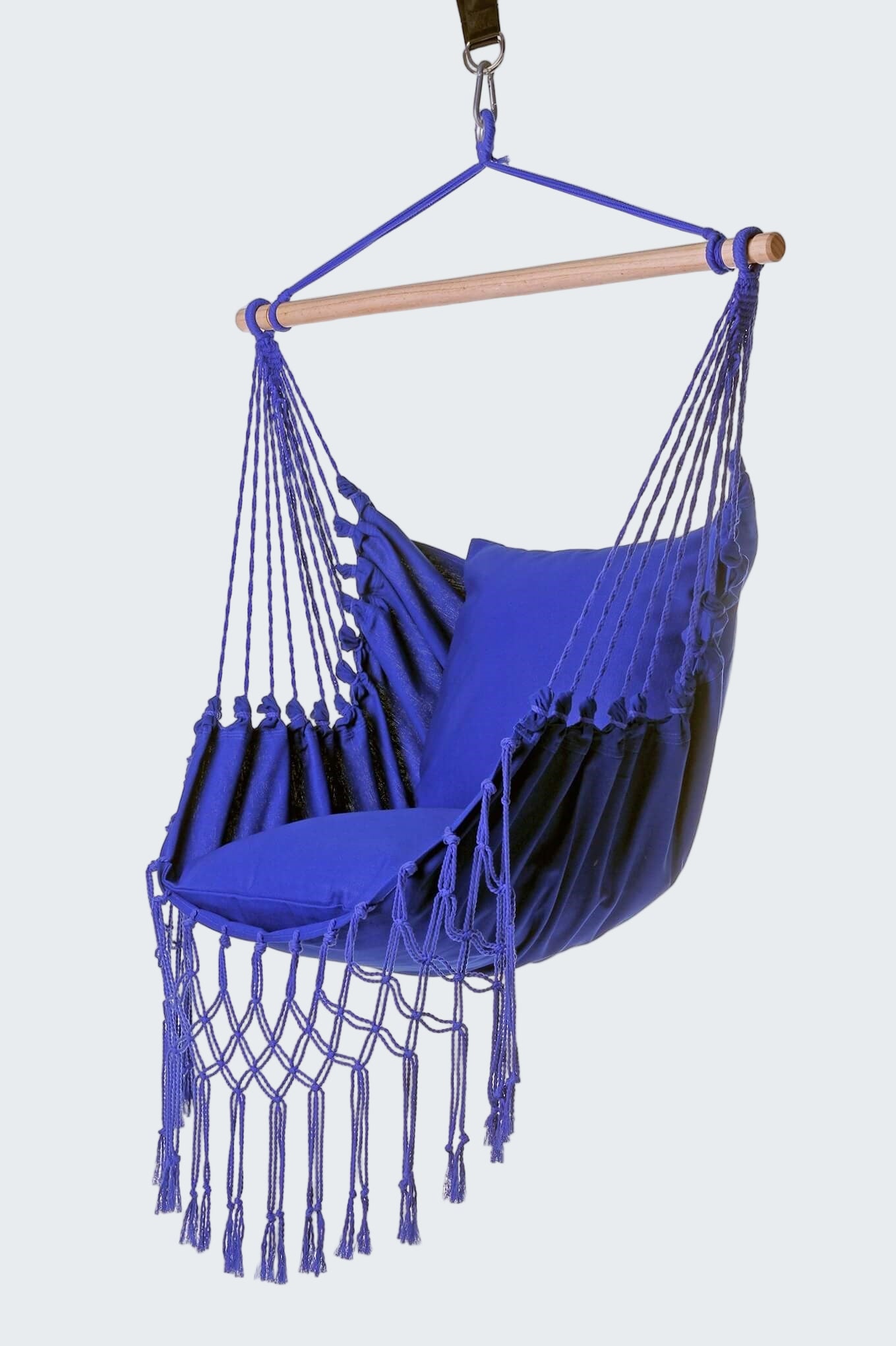 Blue hammock chair with tassels on a white background