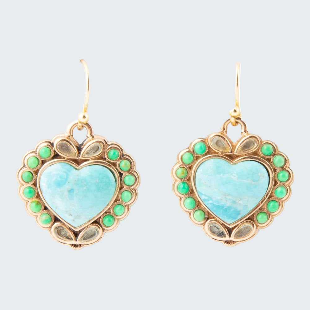 Heart-shaped earrings with turquoise centers and green accents on a white background