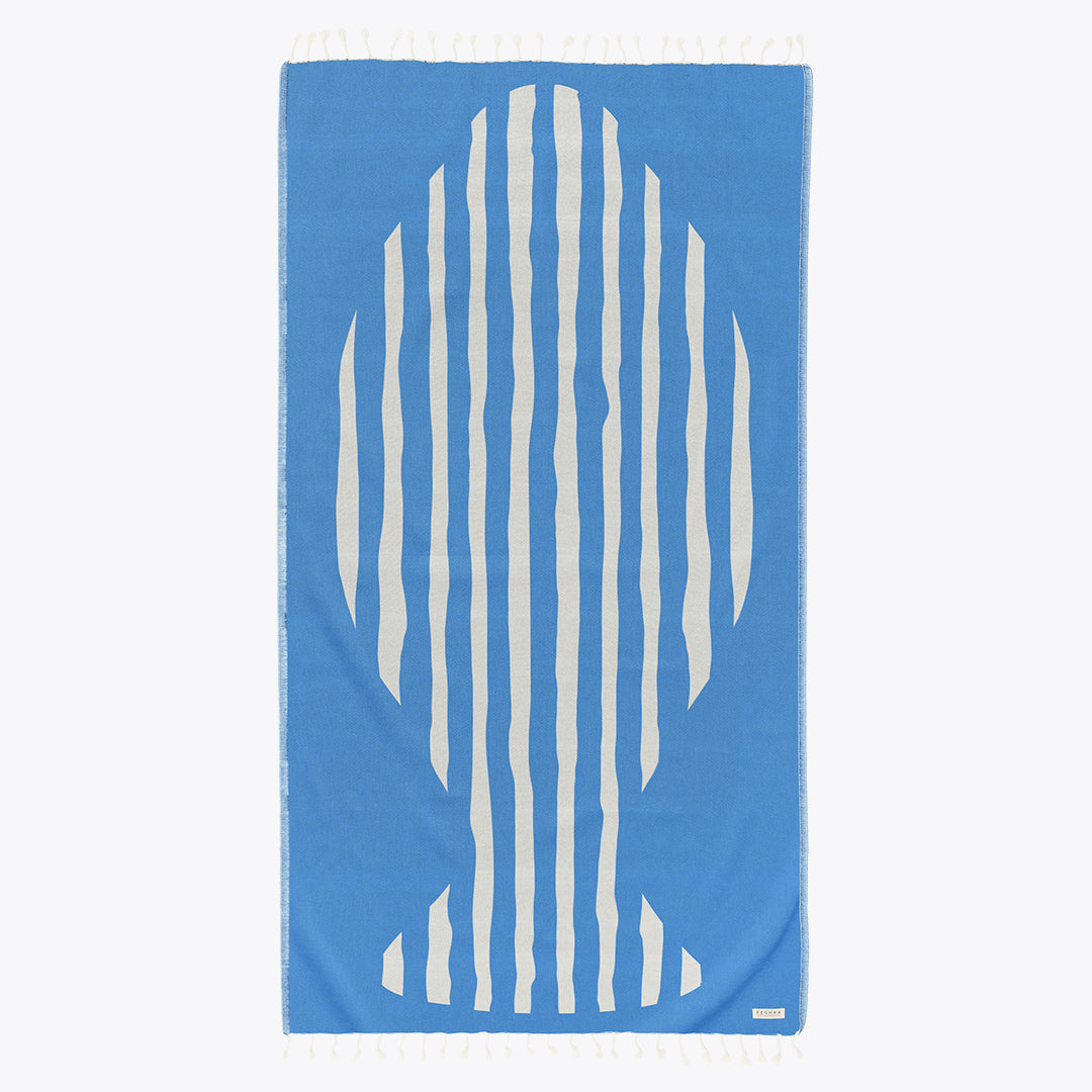 Blue towel with white abstract pattern on a white background