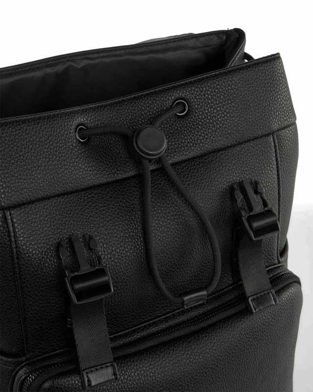 Black leather backpack with buckles on a white background