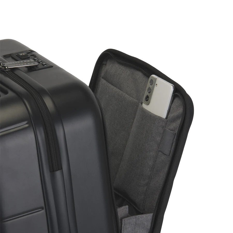 Black suitcase with a pocket containing a smartphone on a white background