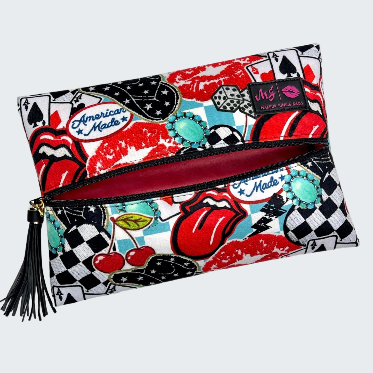 Colorful clutch bag with graphic designs on a white background