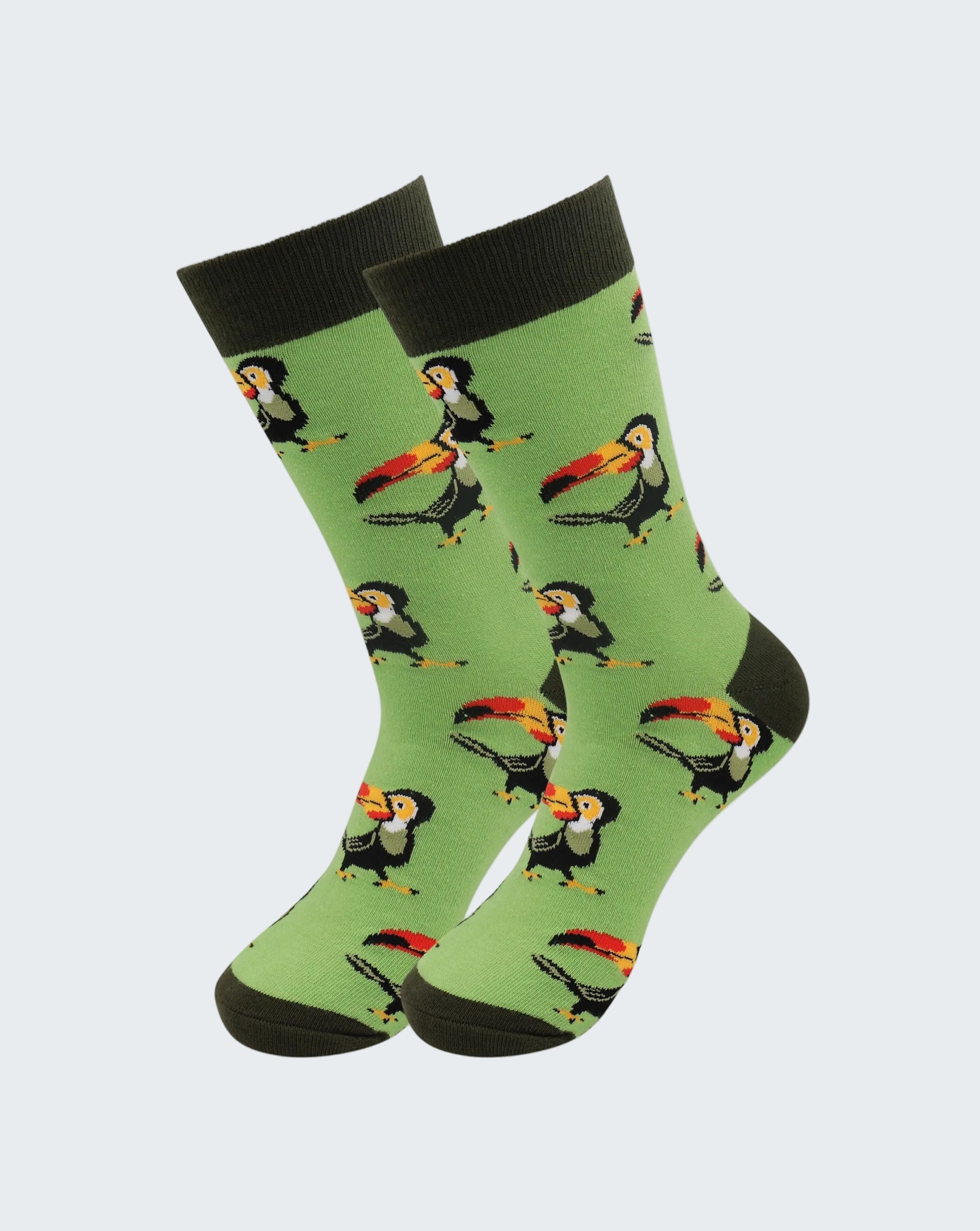 Green socks with toucan pattern on a white background