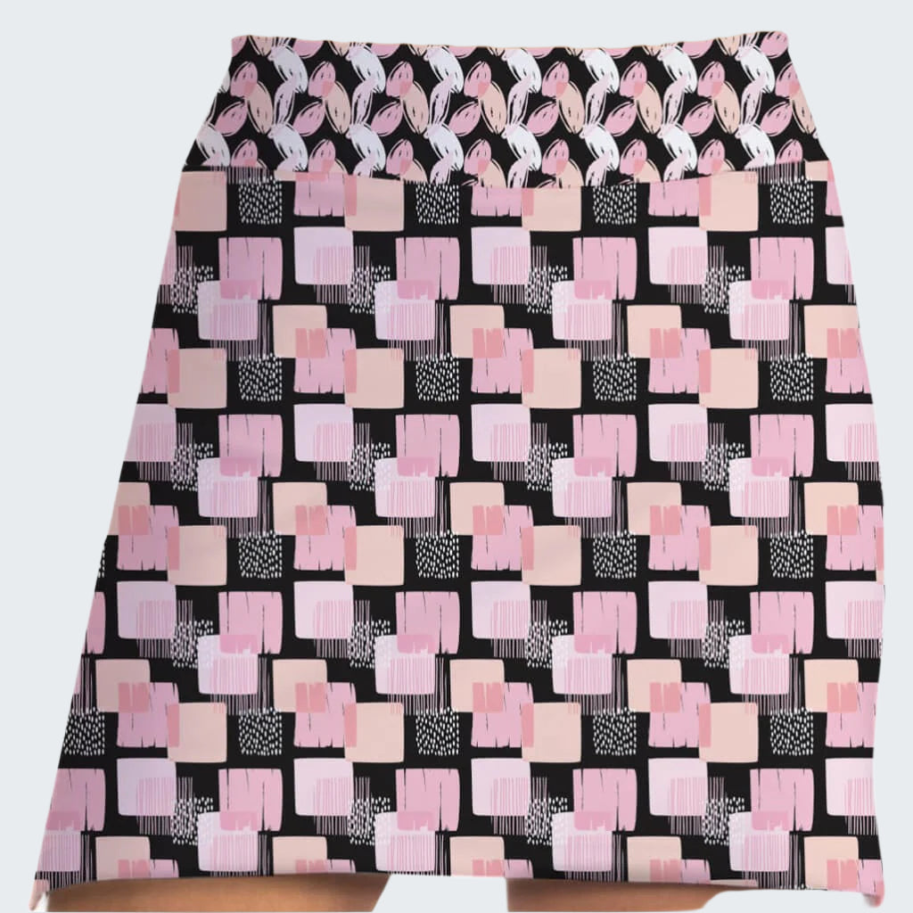 Skirt with pink and white geometric pattern on black background