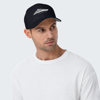 Man wearing a black cap with a logo on a white background