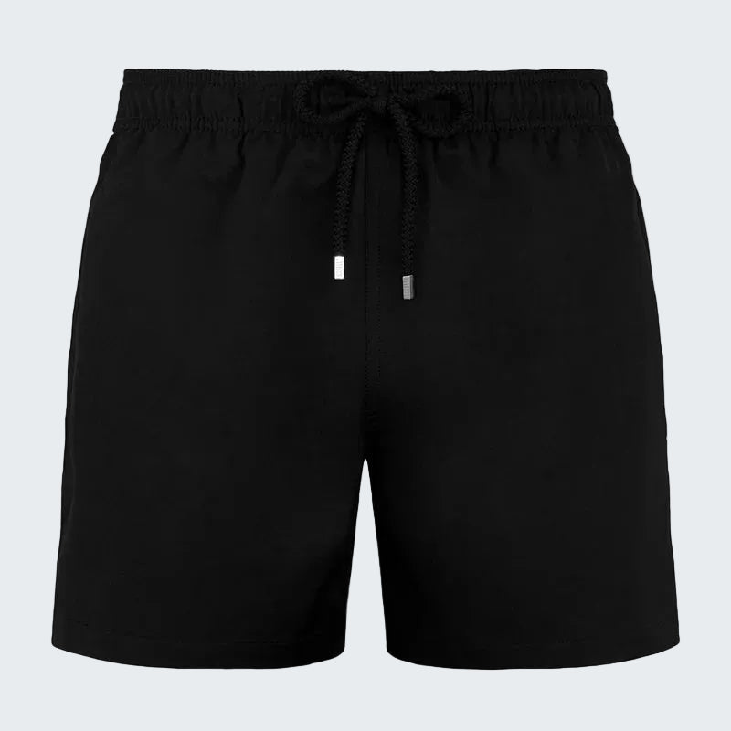 Black shorts with a drawstring on a white background