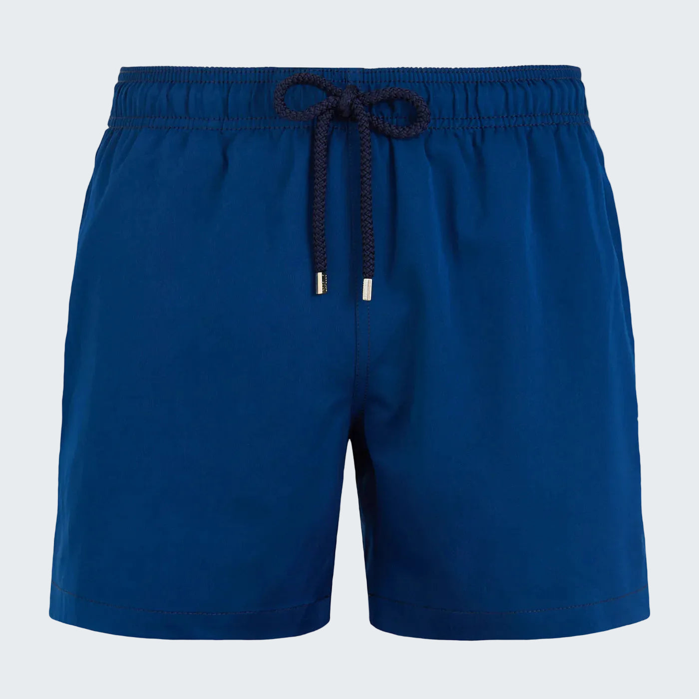 Blue shorts with a drawstring on a white background