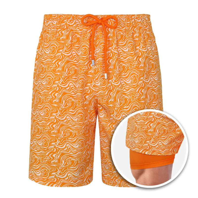 Orange swim shorts with a wavy pattern on a white background